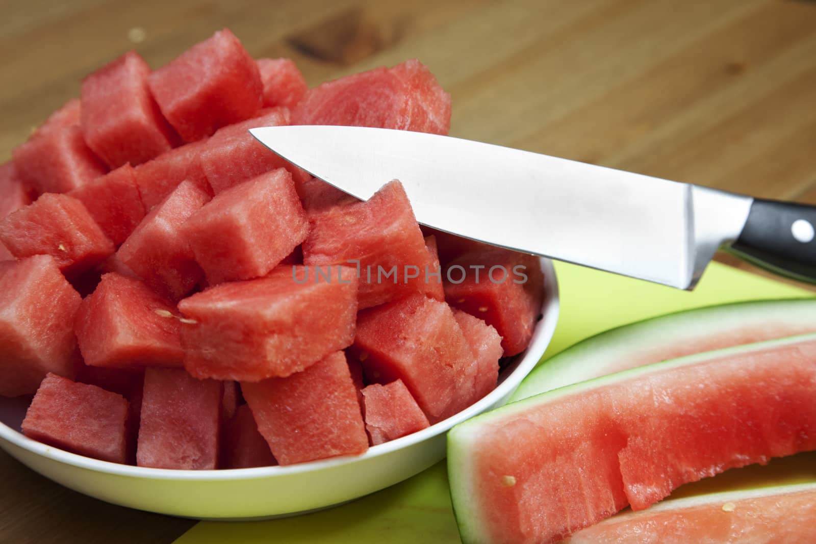 Fresh diced watermelon by monkeystock