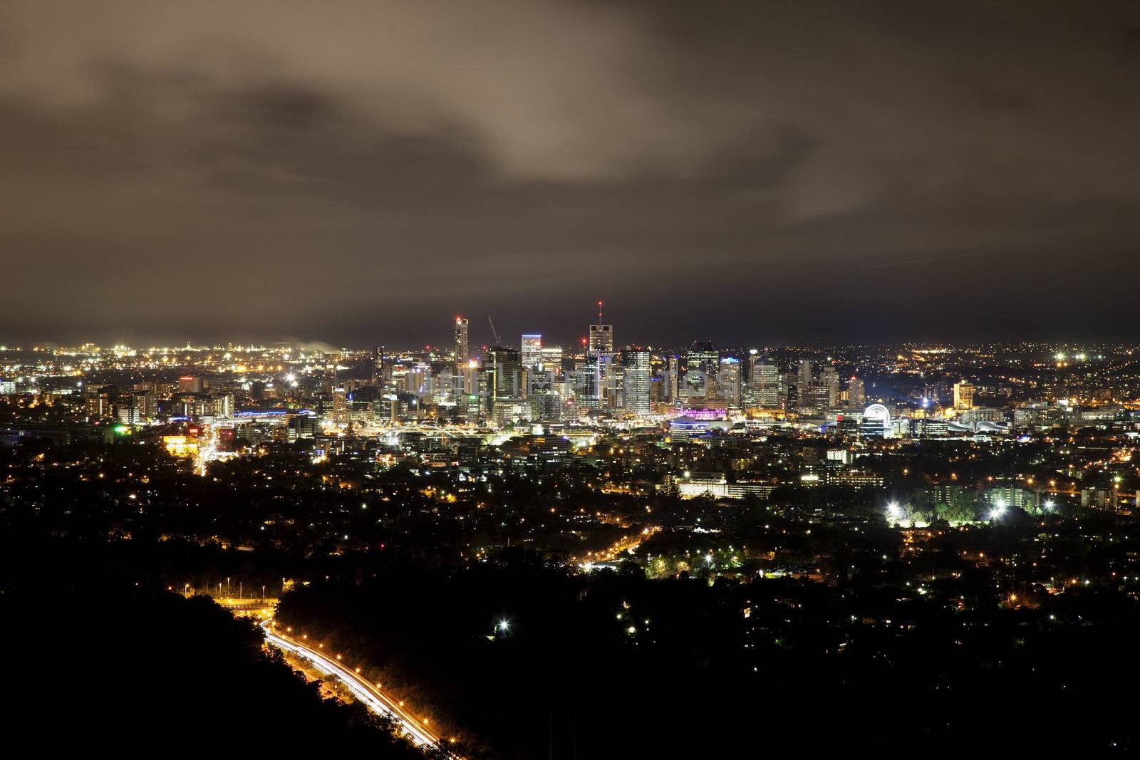 Panoramic shot of the city of Brisbane on an overcast night.