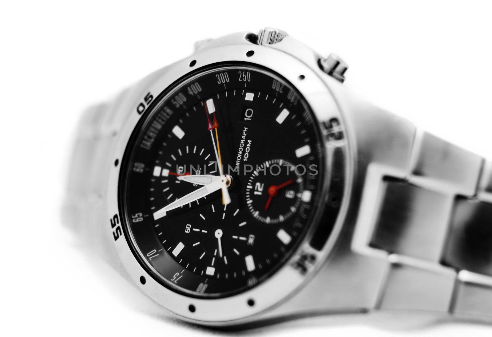 close up of a modern mens watch isolated againts white