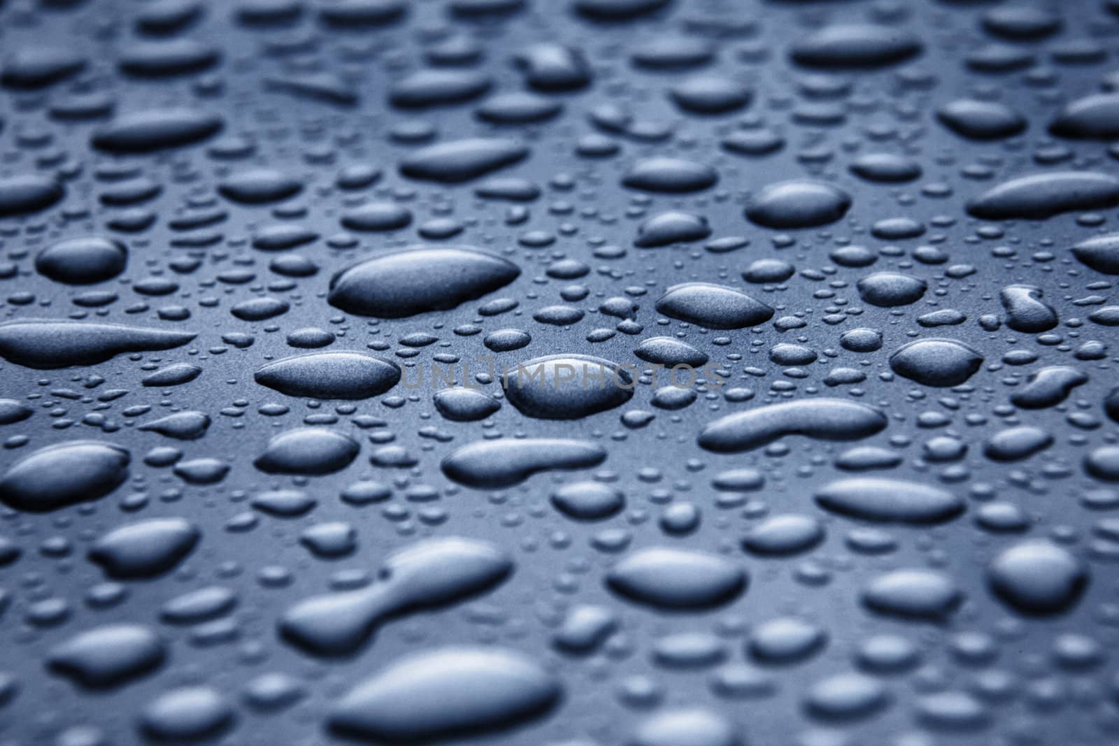Water on a metal surface by monkeystock