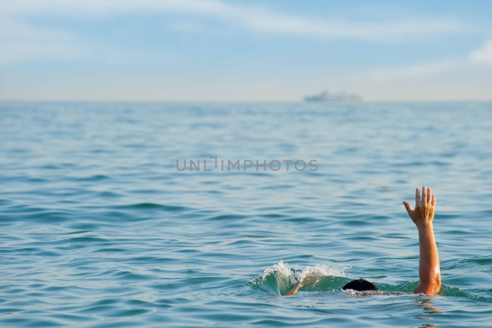 The drowning man. The man in water asks about the help.