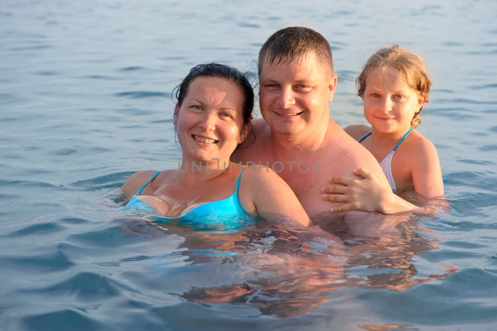 Happy family in the sea by galdzer