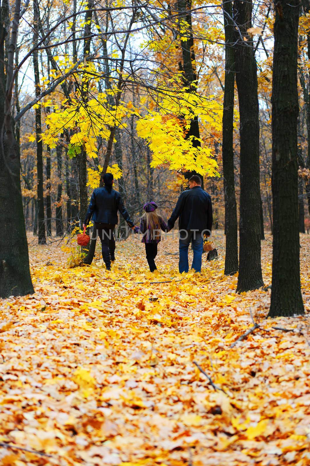 Family in autumn forest by galdzer