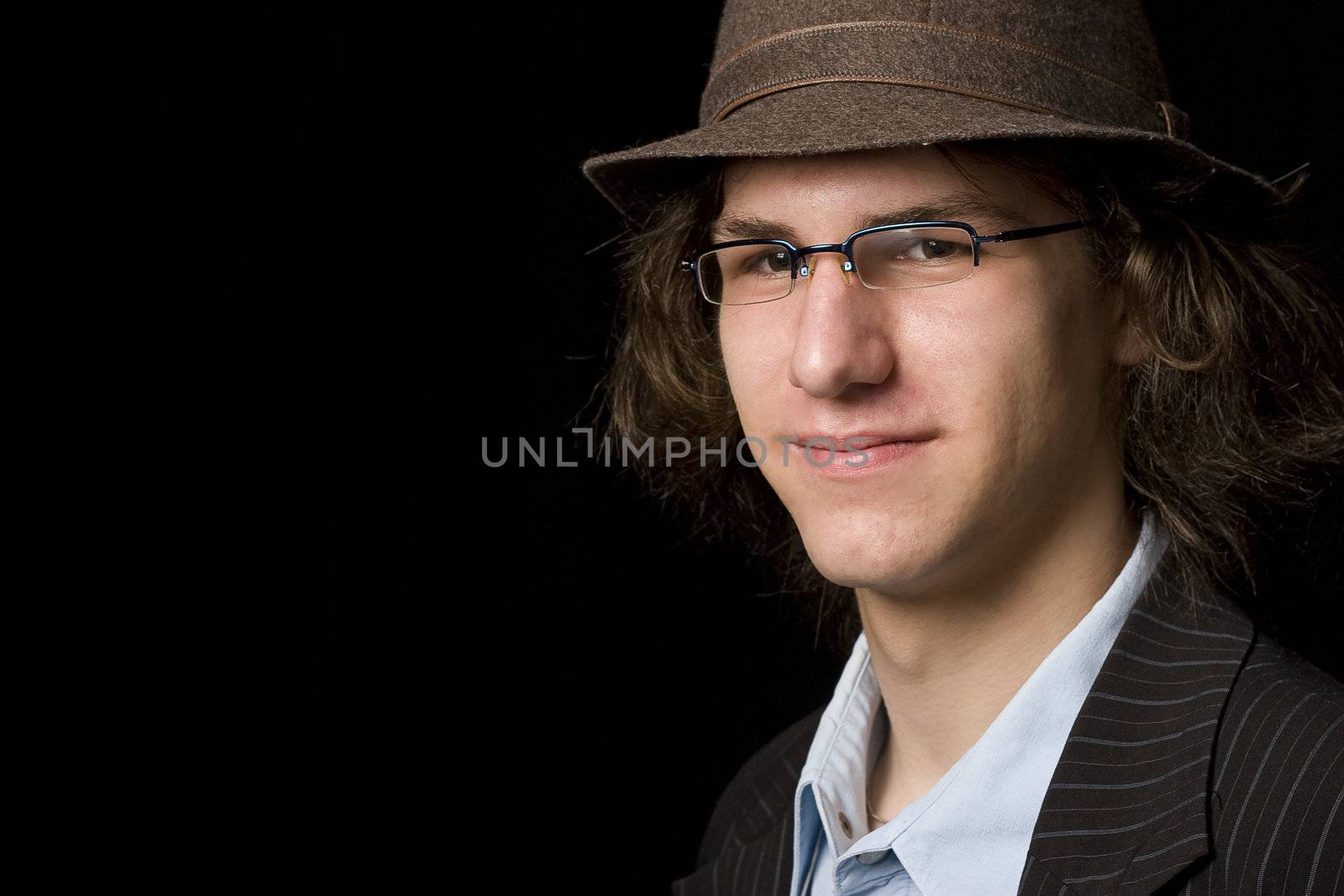 Male teenager with a hat
