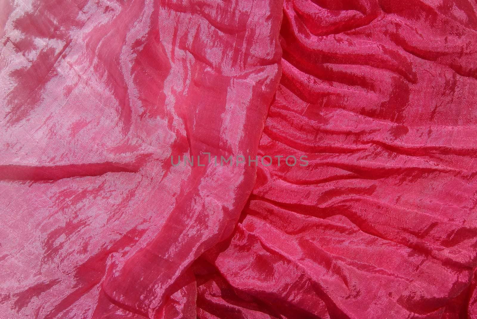 Red silk scarf is decorated and fascinates