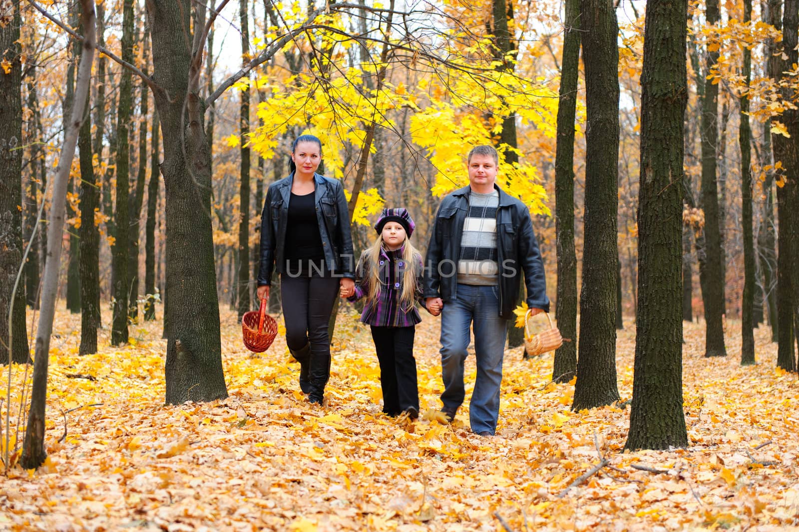 Family in autumn forest by galdzer