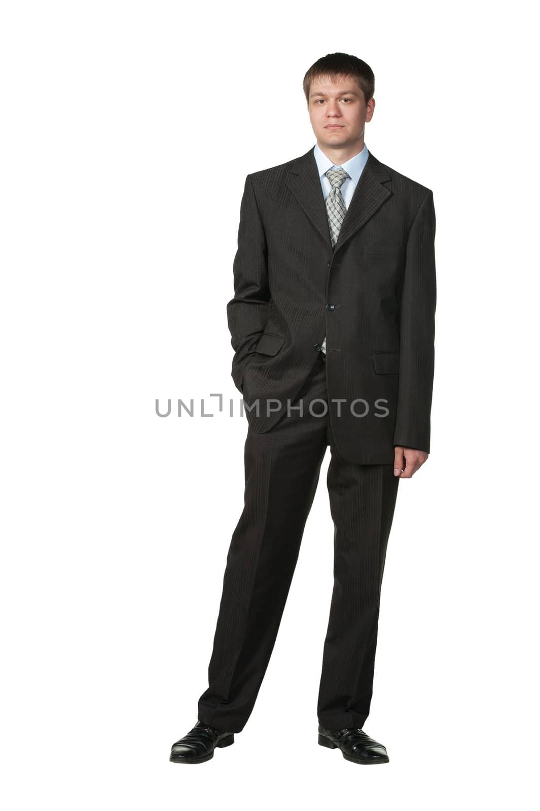 The young businessman in a suit. It is isolated on a white background
