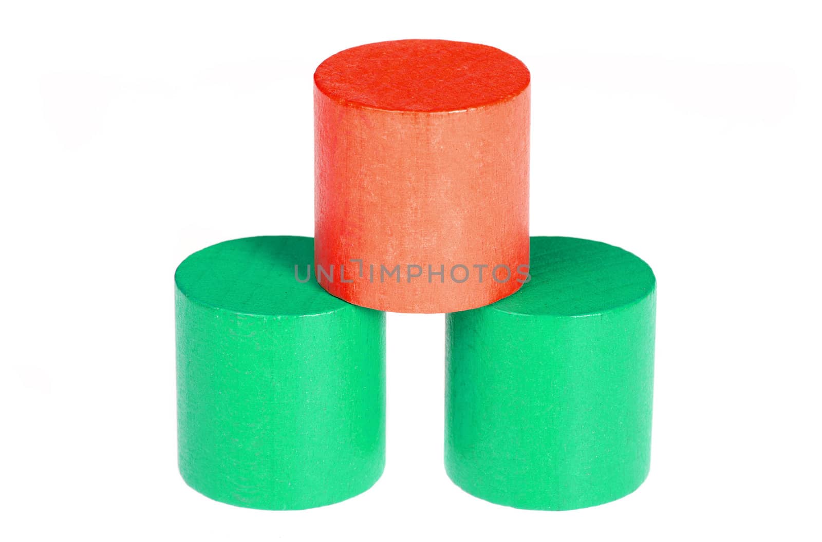 Wooden colour cylinders. It is isolated on a white background