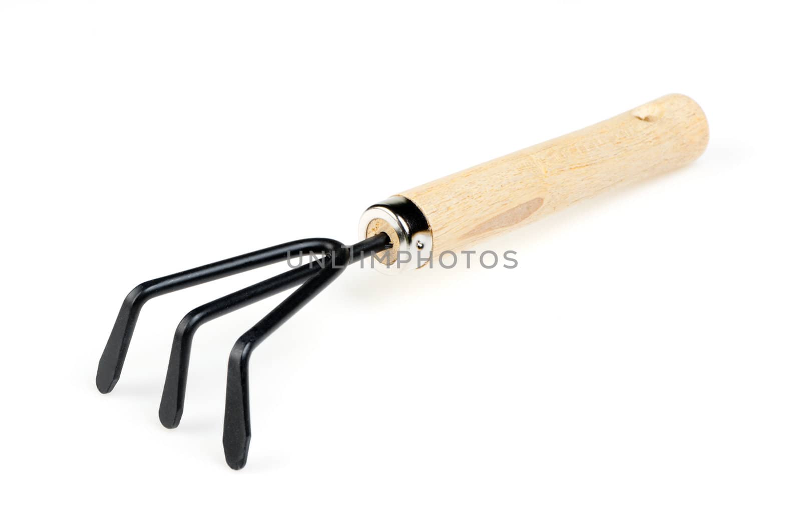 The garden tool a rake. Isolated on a white background