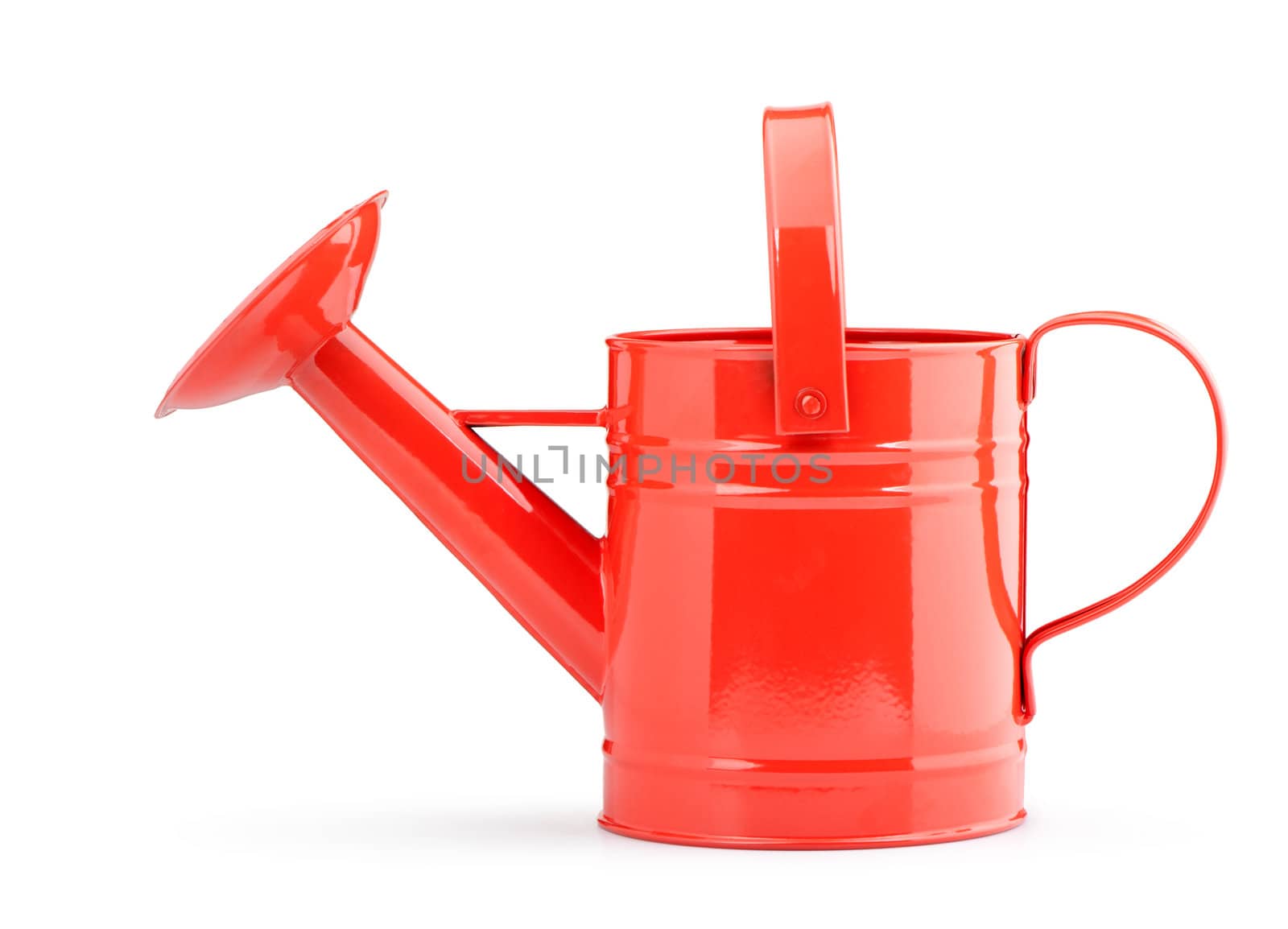 Red watering can. It is isolated on a white background