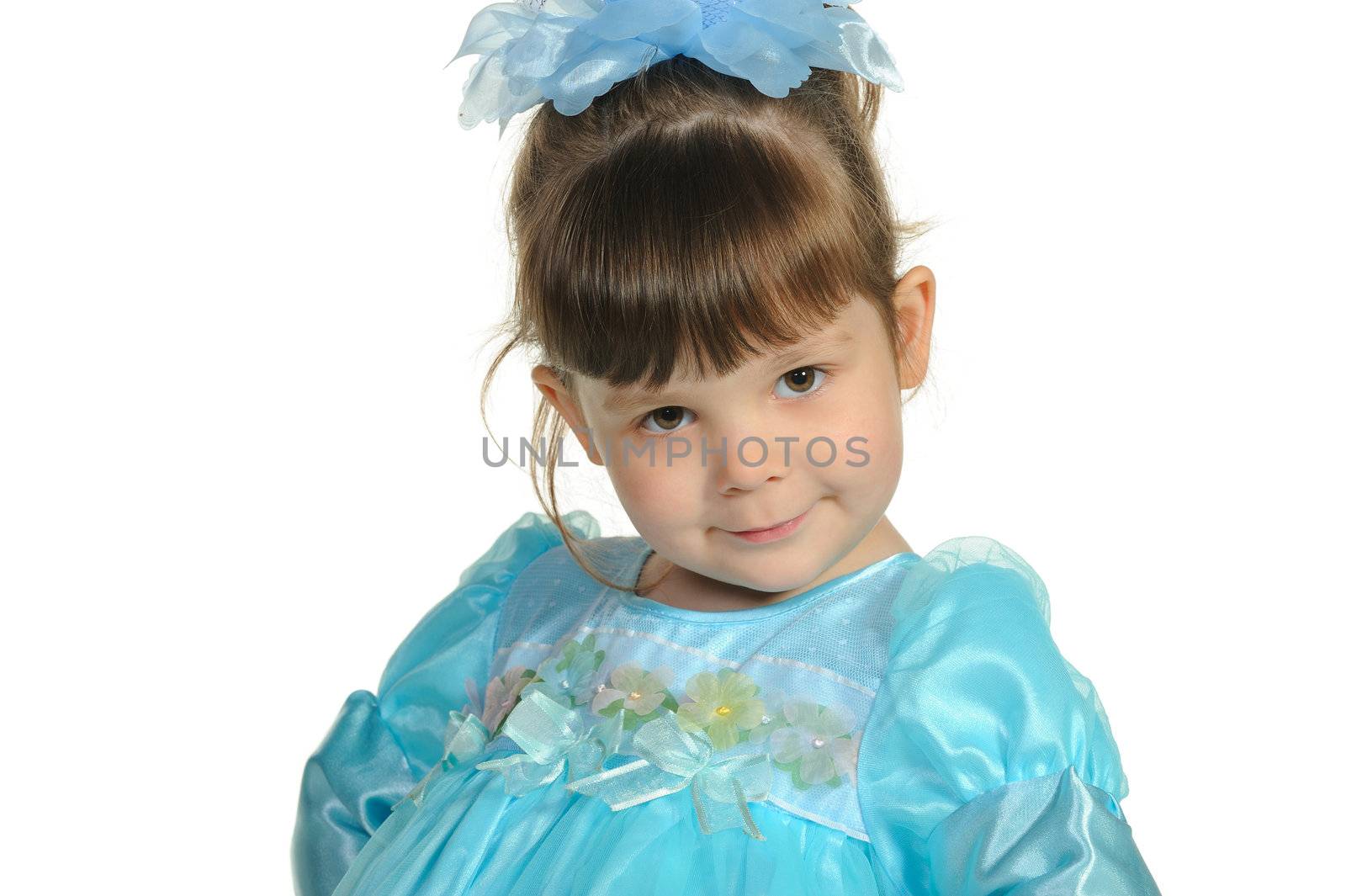 Pretty the little girl in a blue dress. It is isolated on a white background