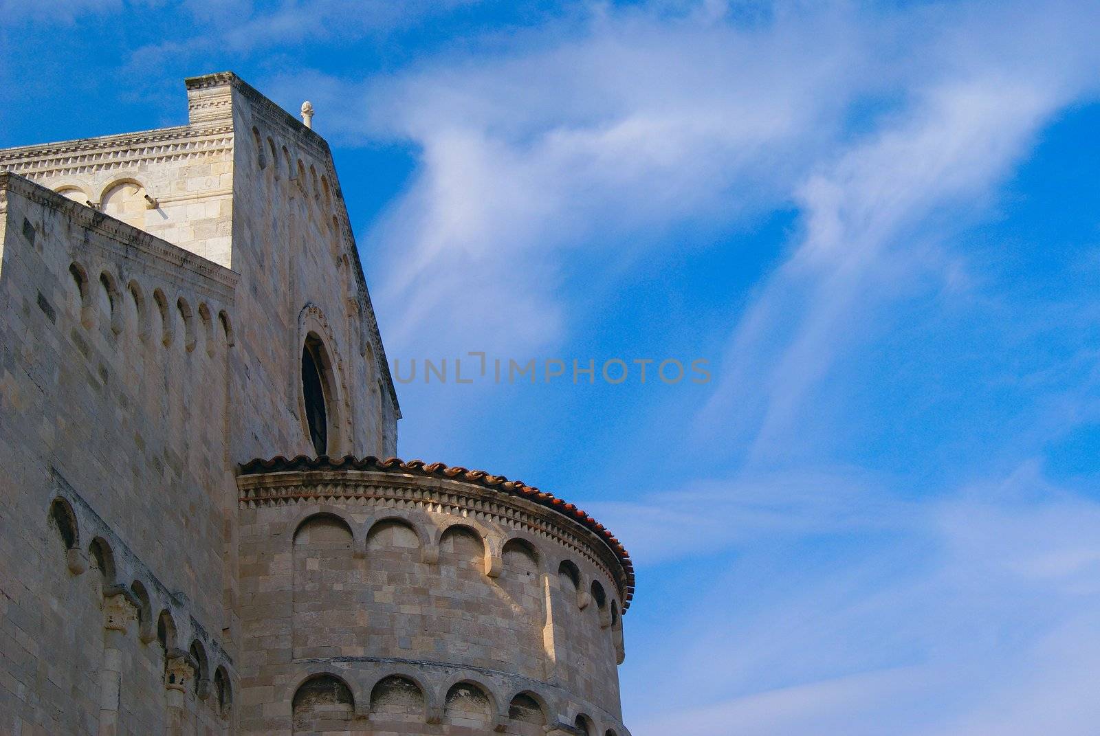 old  cathedral tower under sky blue Italy