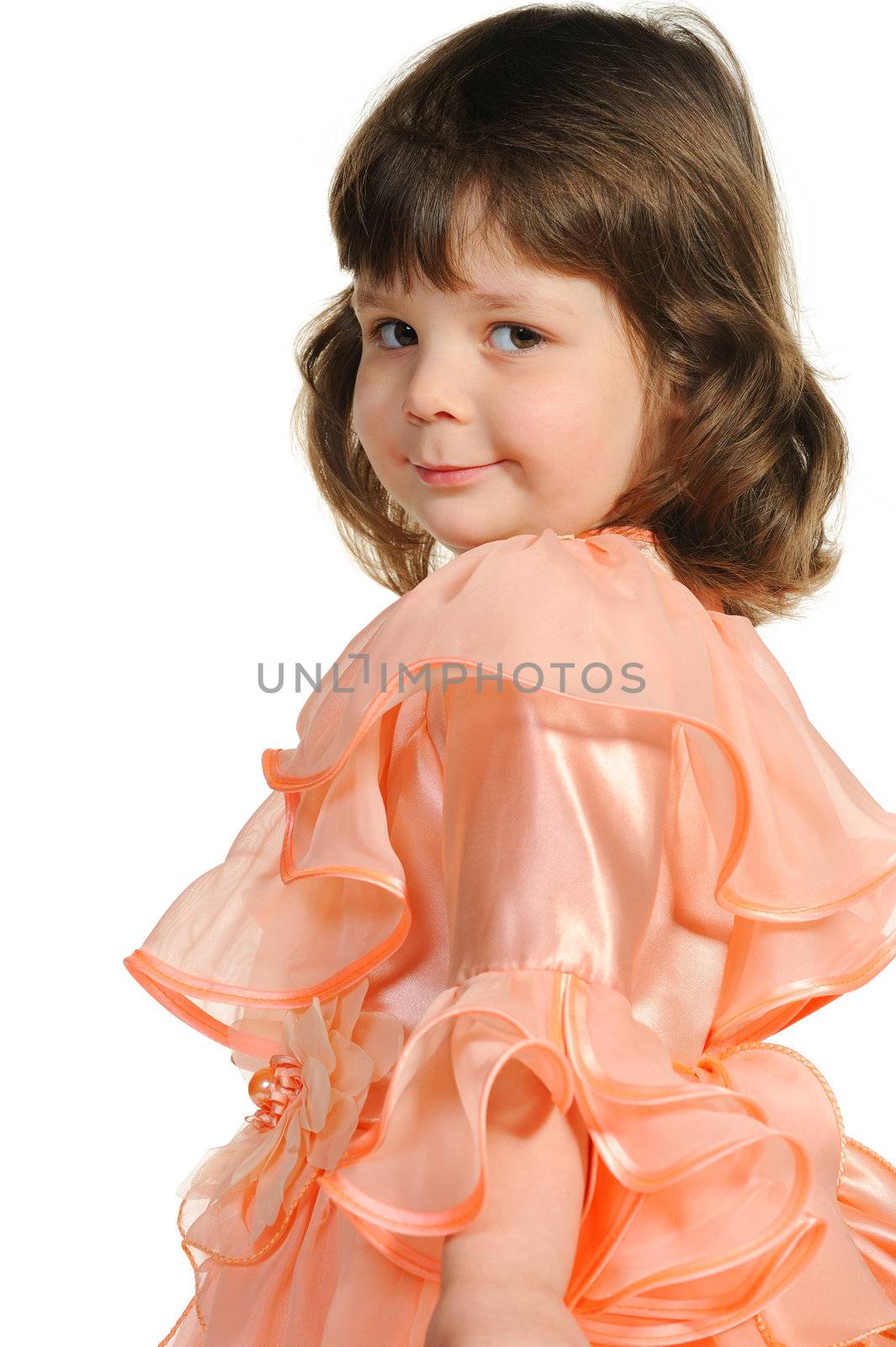 The lovely little girl close up. It is isolated on a white background