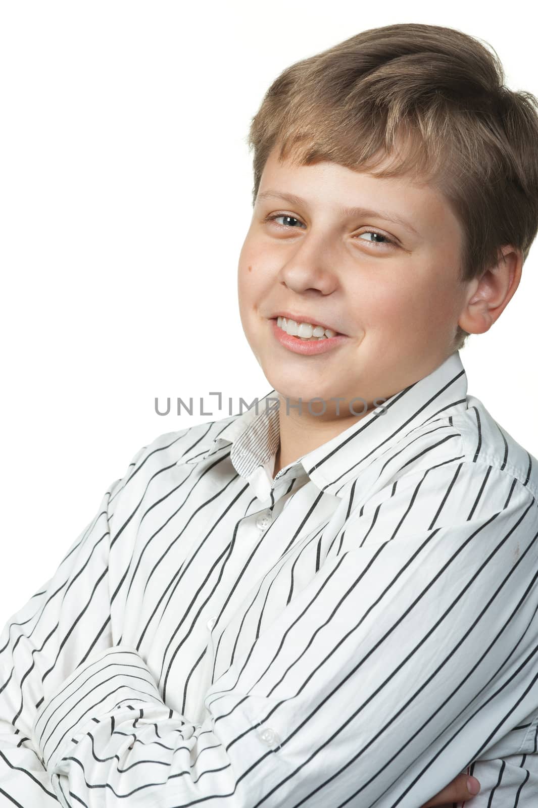 Portrait of the teenager. It is isolated on a white background