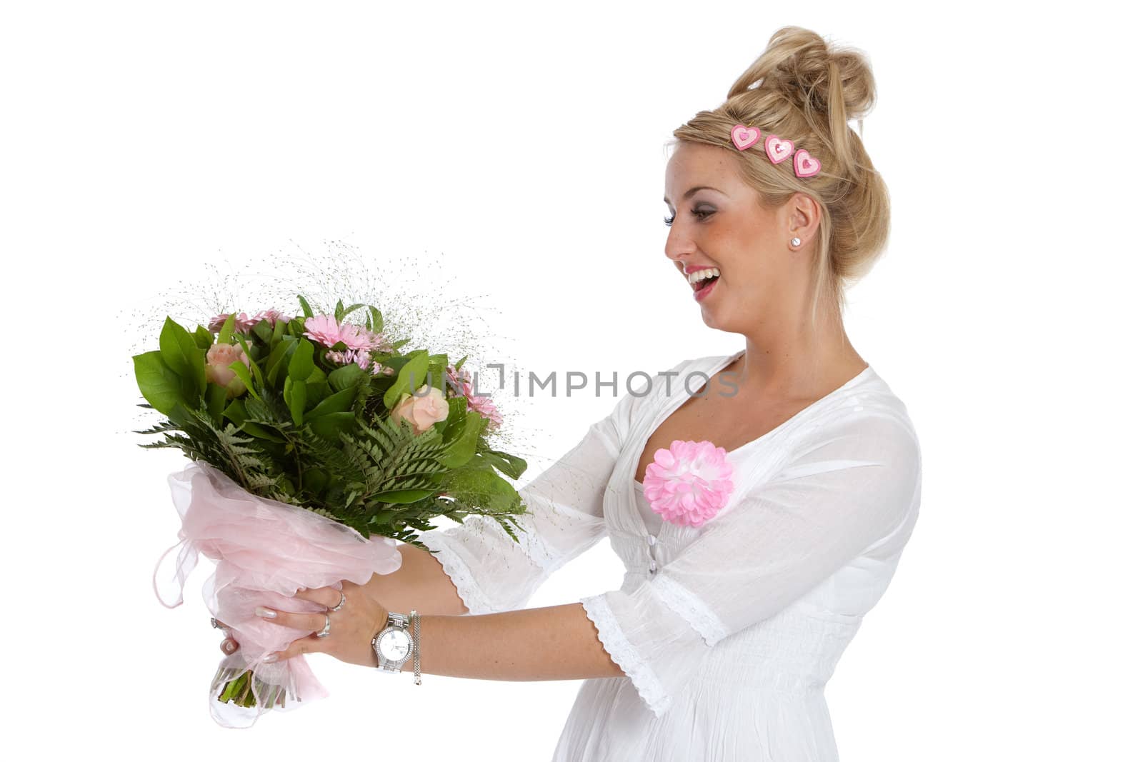 Beautiful blond girl receiving a bunch of flowers for valentines