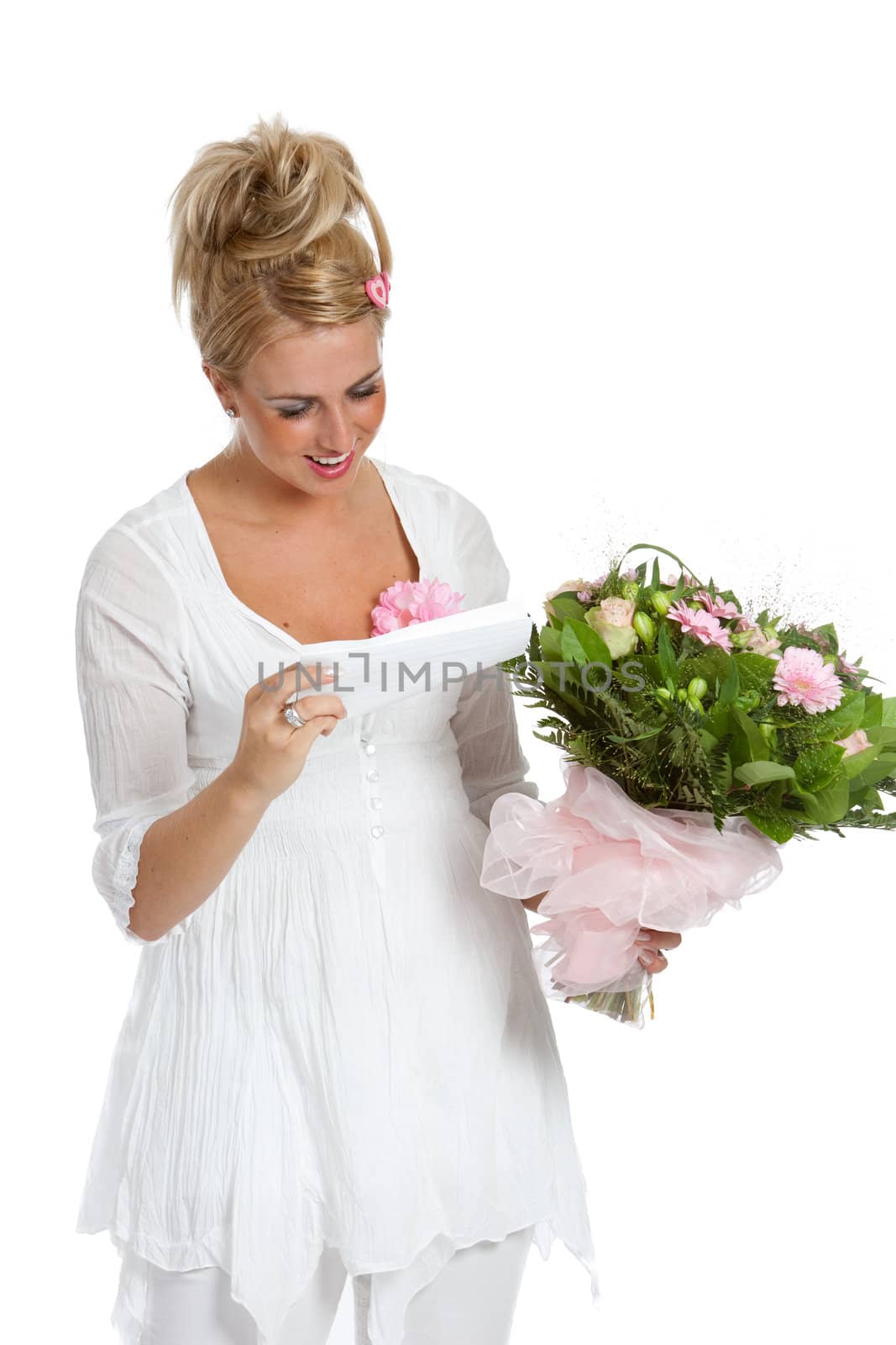 Pretty blond girl receicing a love letter with flowers for valentine