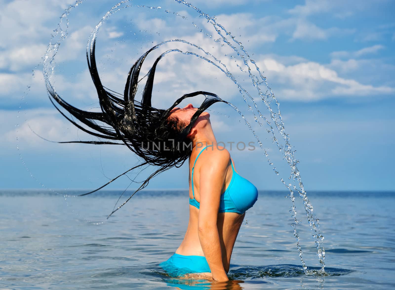 The woman with splashes from hair by galdzer