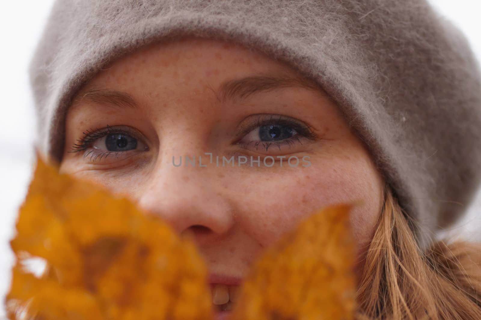 Autumns - Closeup of a cute young woman looking at you 