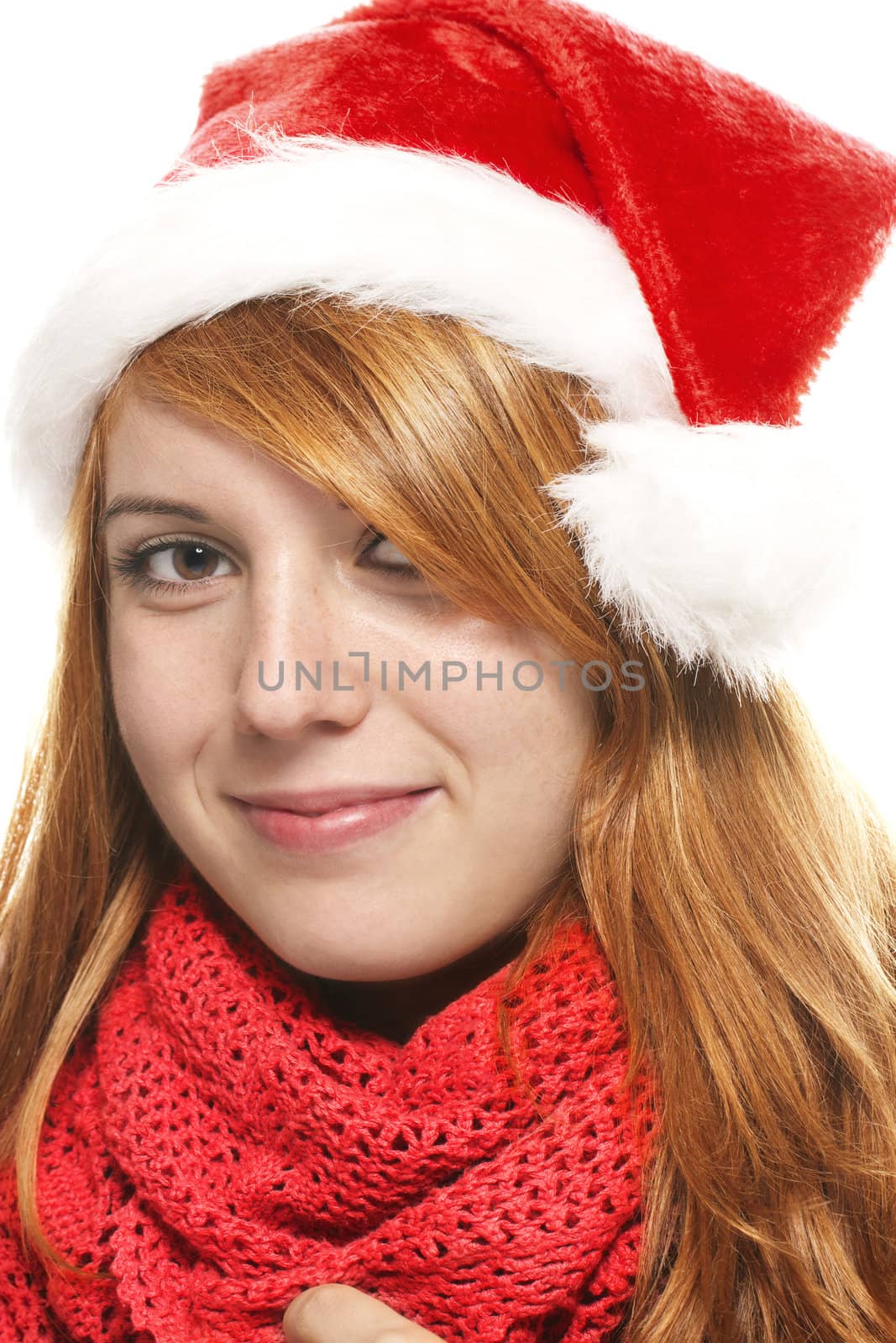 smiling redhead young woman with santas hat by RobStark
