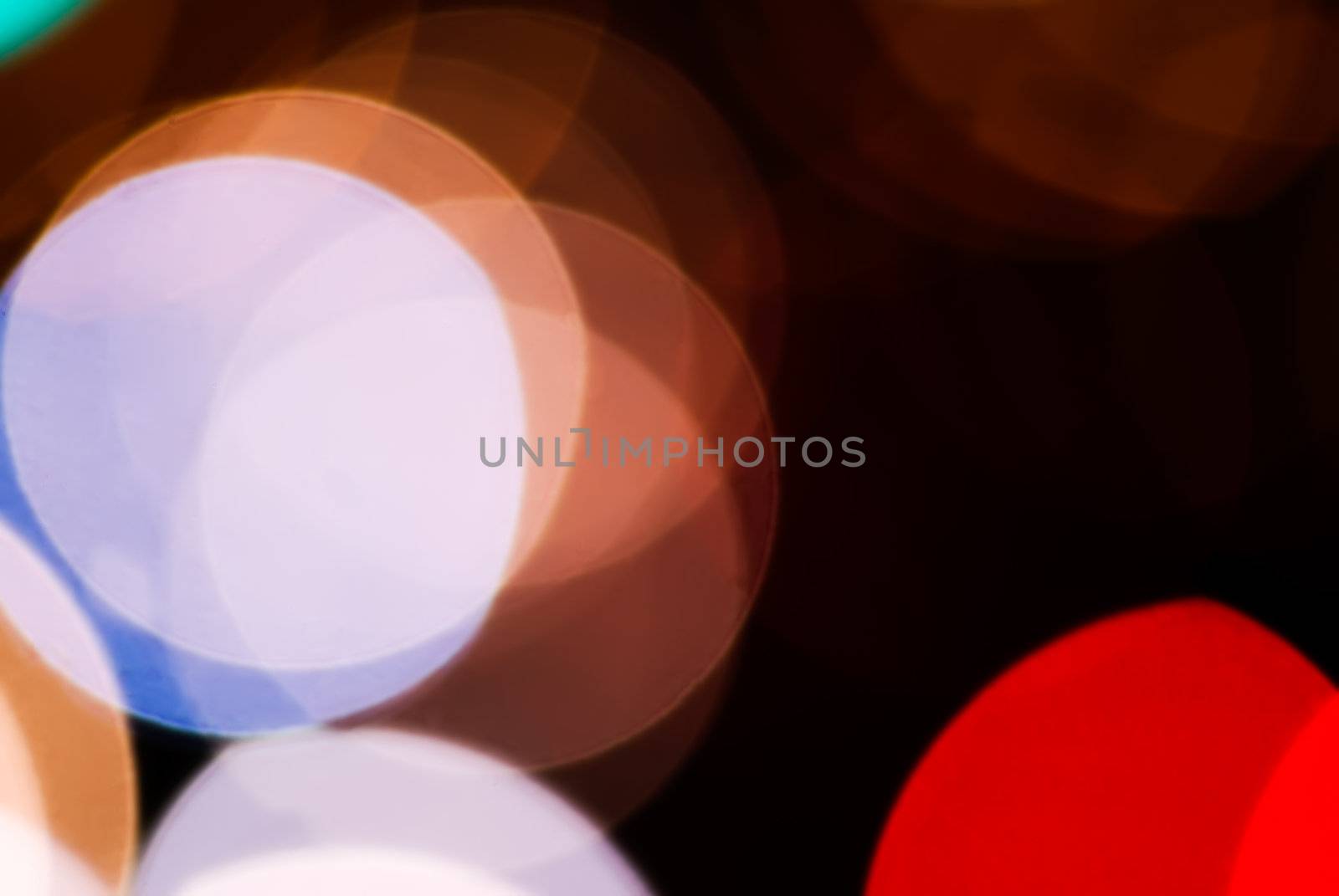 It is beautiful defocused light dots bokeh background.