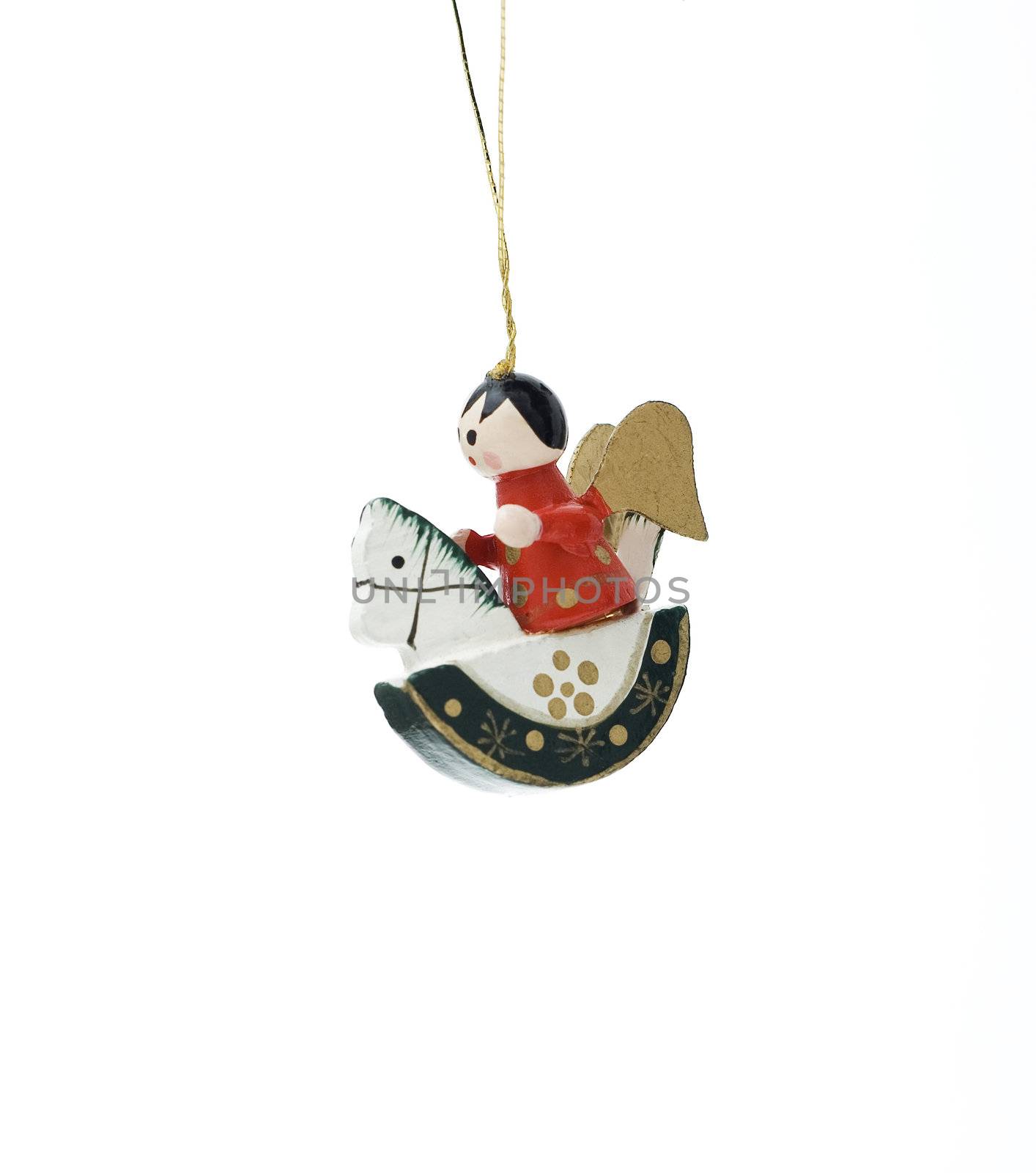 Wooden Christmas decoration with angel on horse isolated on white