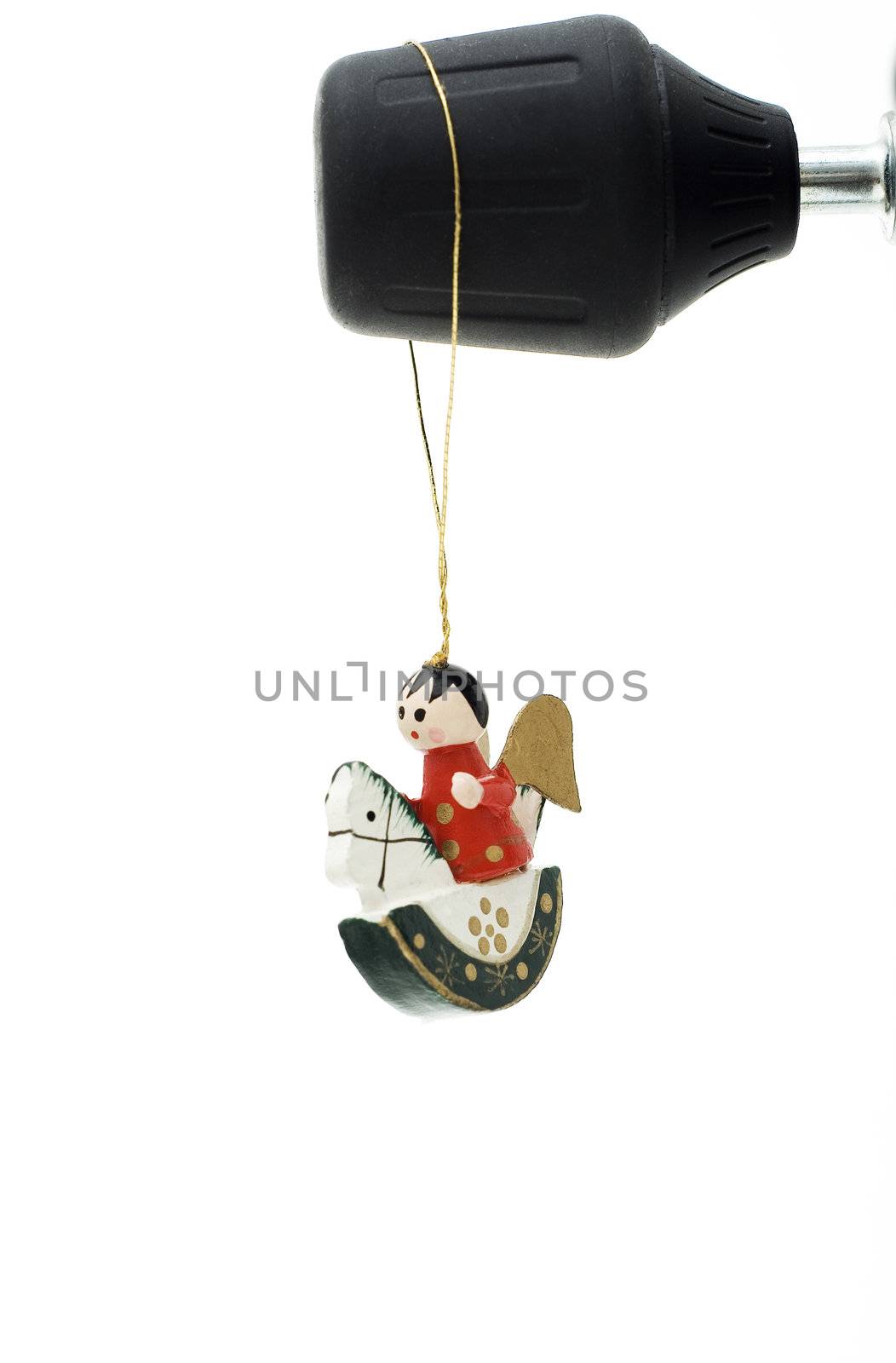 Wooden Christmas decoration hanging on tripods handle