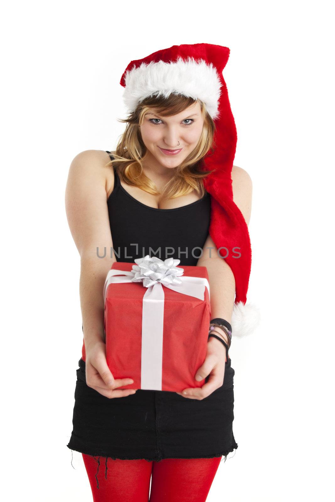 young woman holding a christmas gift isolated on white