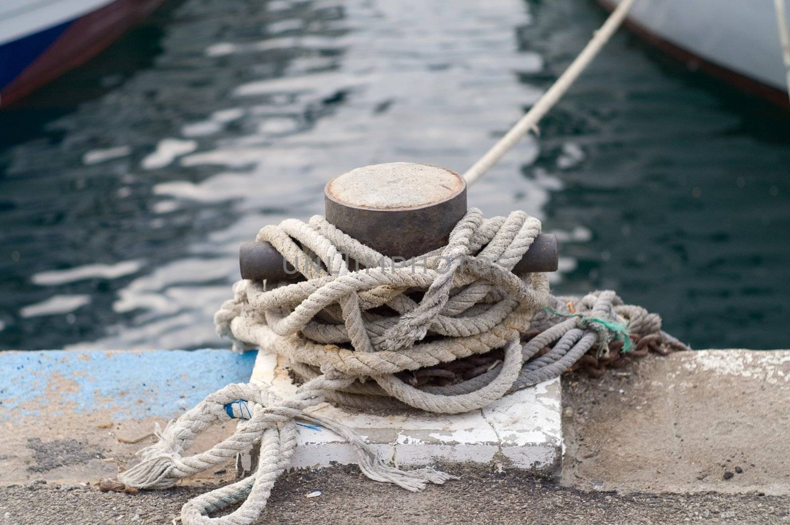 beth close up  in a mediterranean fishing port by olgaolga