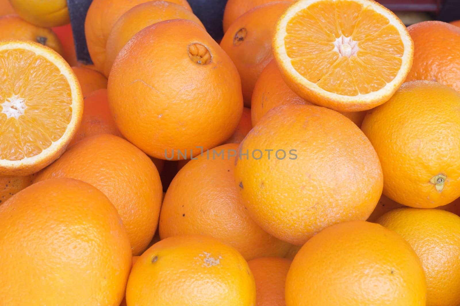 Close up oranges for juice by olgaolga