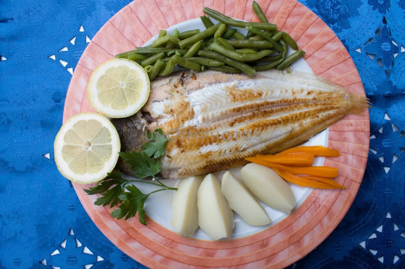 Sole with potatoes and vegetables
