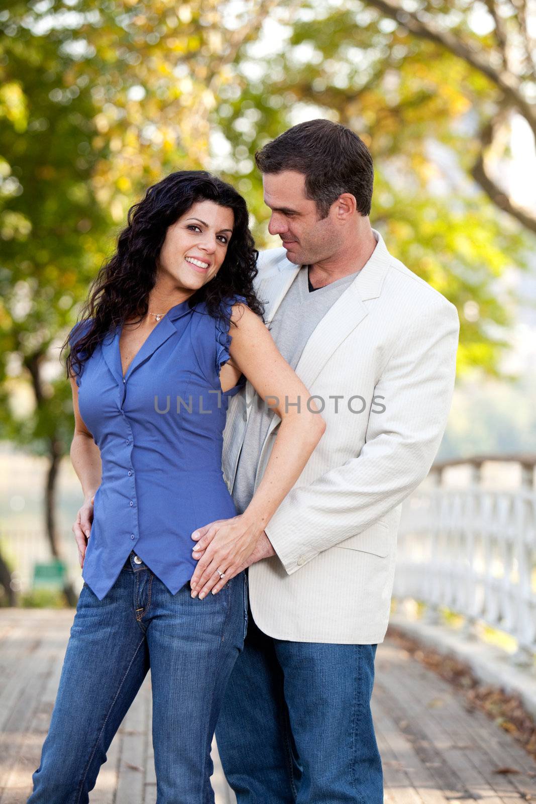 A portrait of a happy couple in the park 