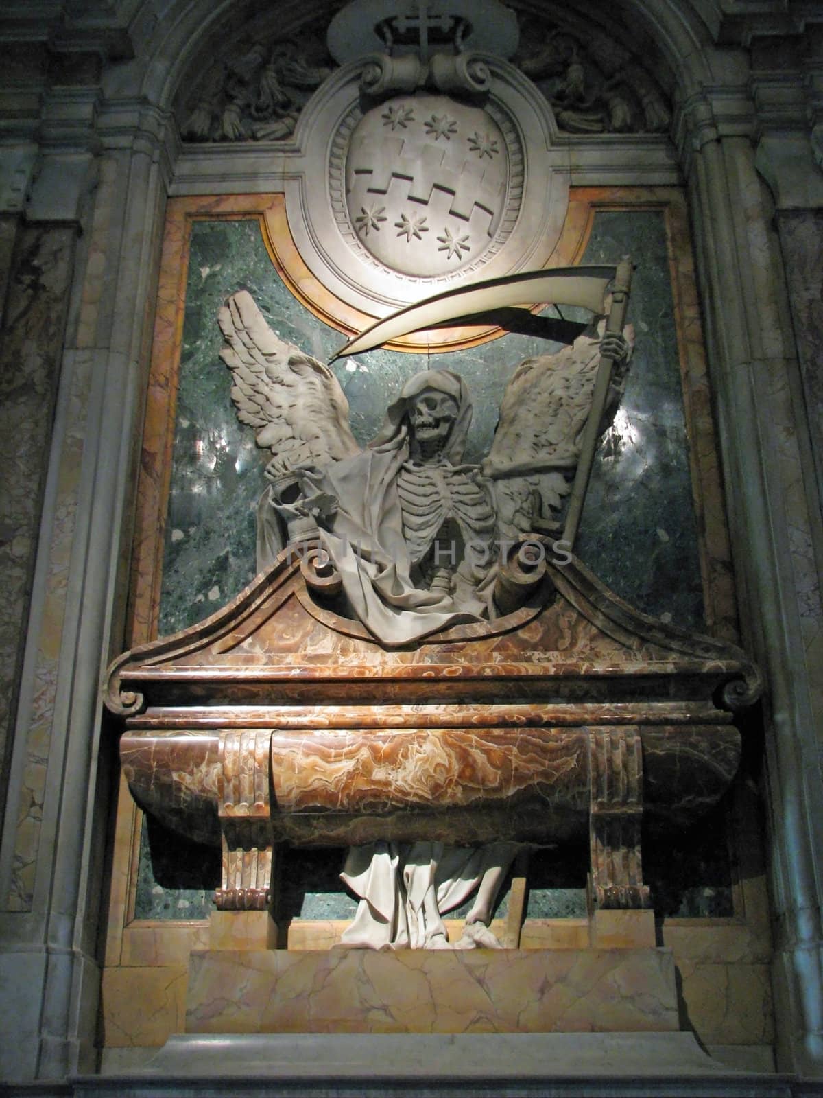 A statue of the Grime Reaper the Angel of Death in St. Peter in Chains Church in Rome, Italy.
