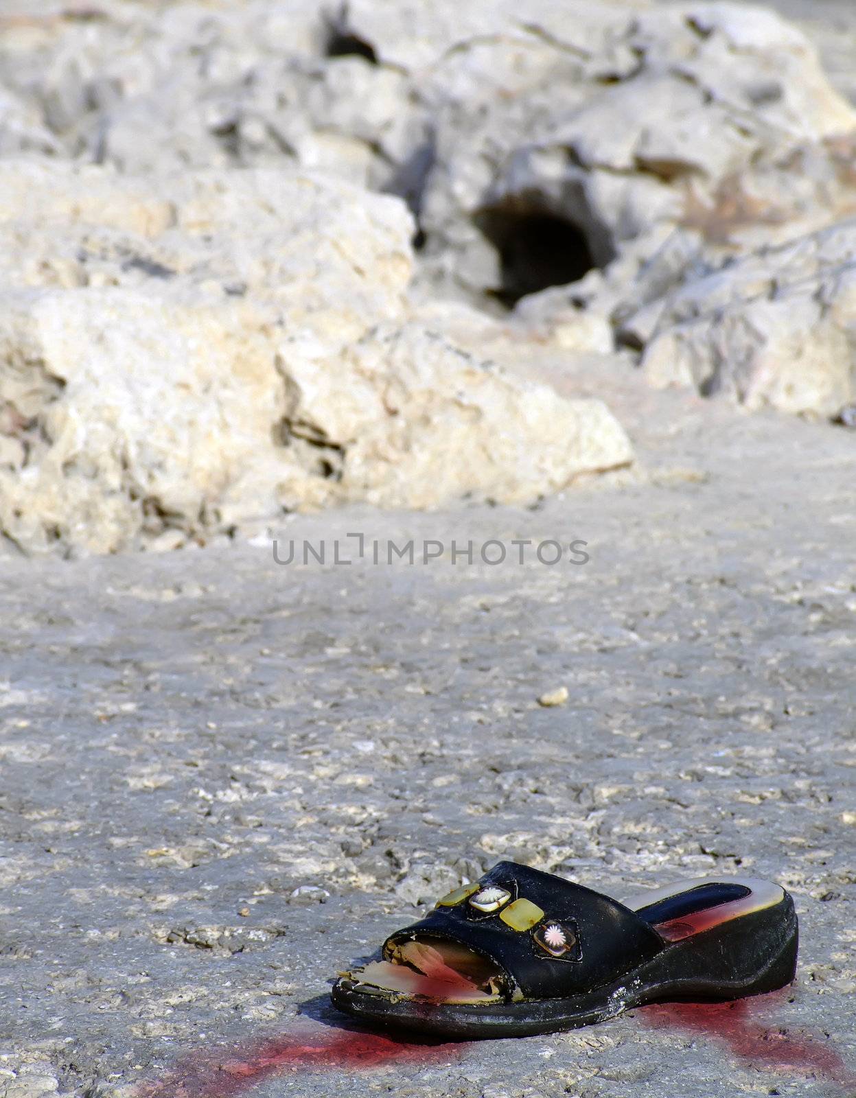 Lone battered shoe belonging to a warzone victim