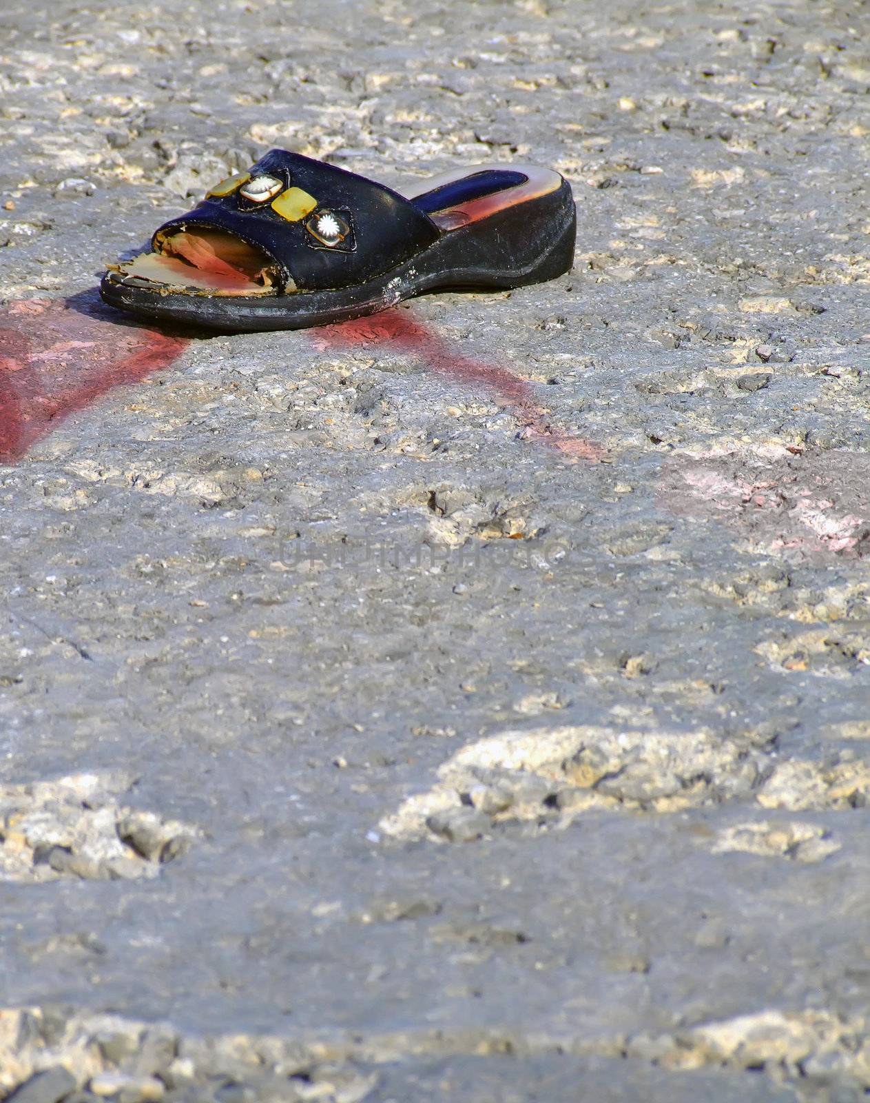 Lone battered shoe belonging to a warzone victim