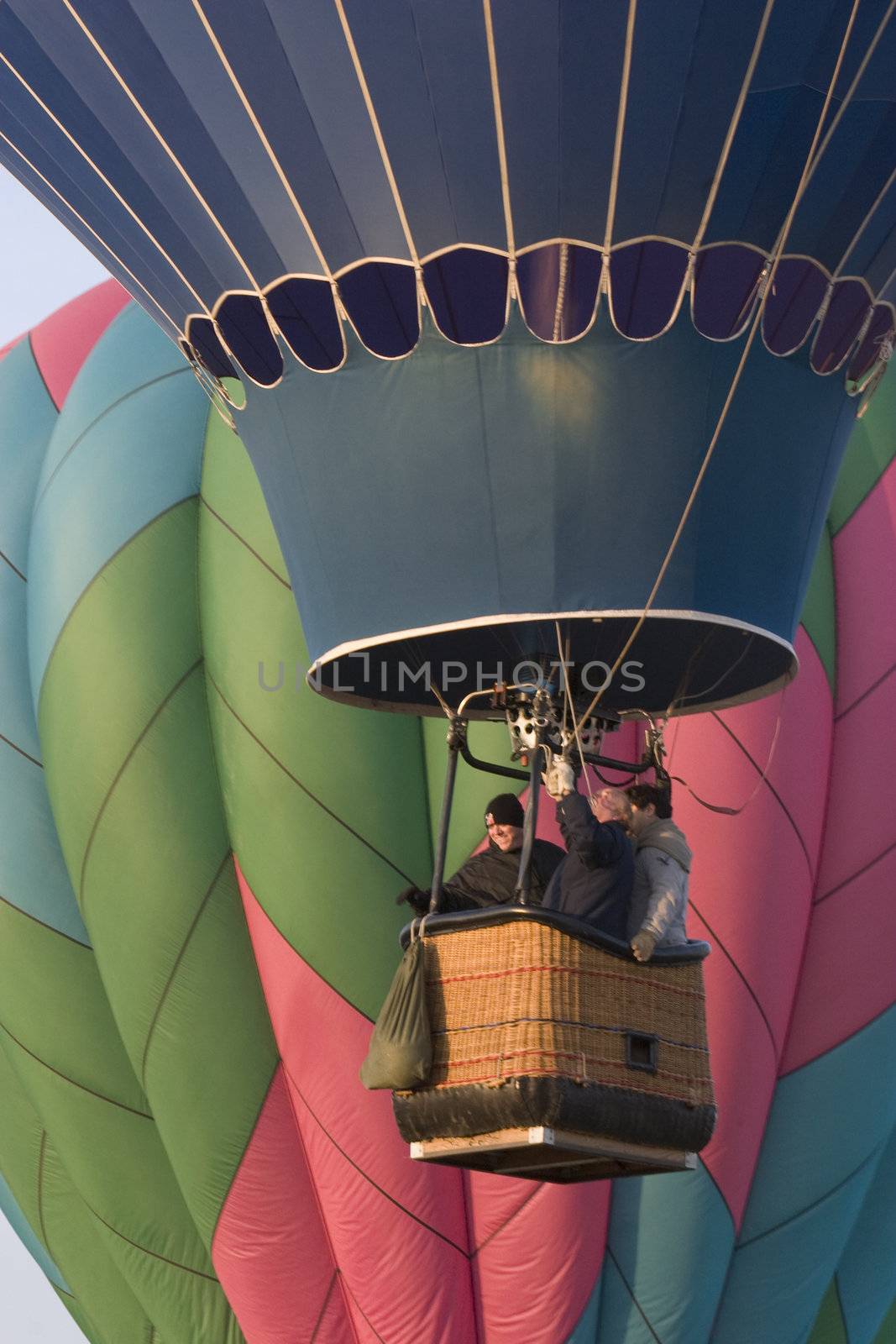 hot air balloon rising at Greeley festival by PixelsAway