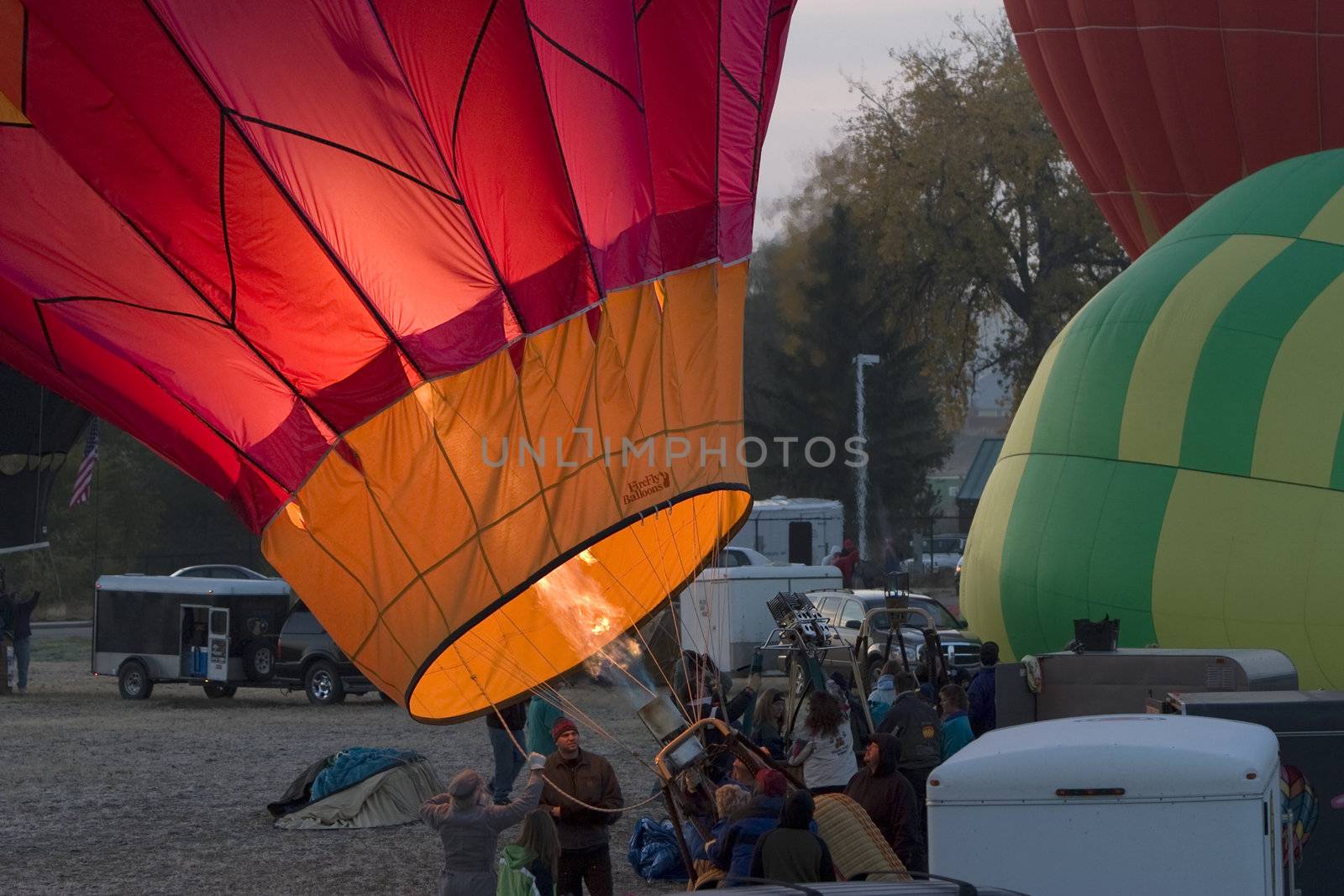 inflating hot air balloon before sunrise at Greeley, Colorado, festival, October 2007