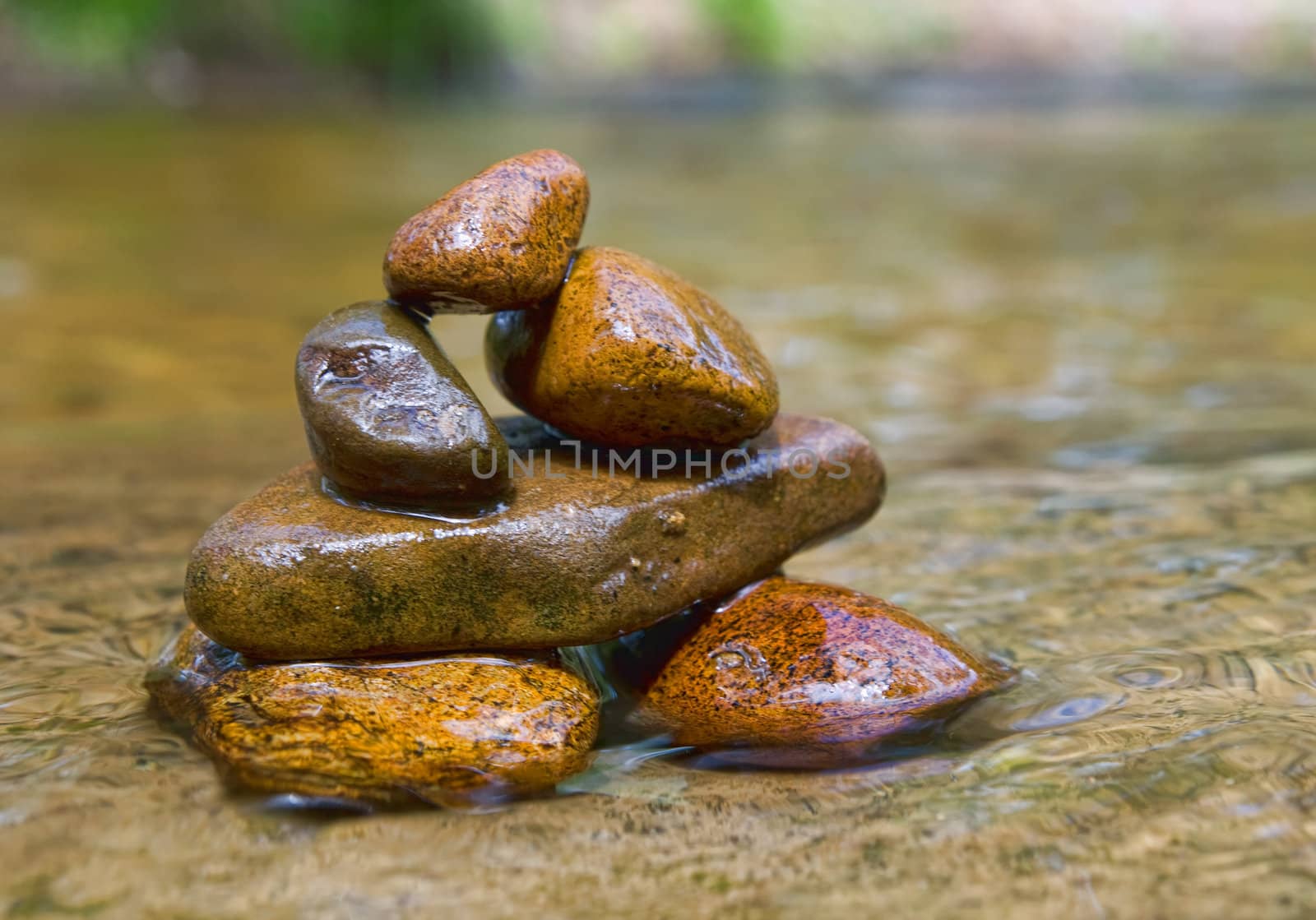 great image of a stack of rocks in a stream