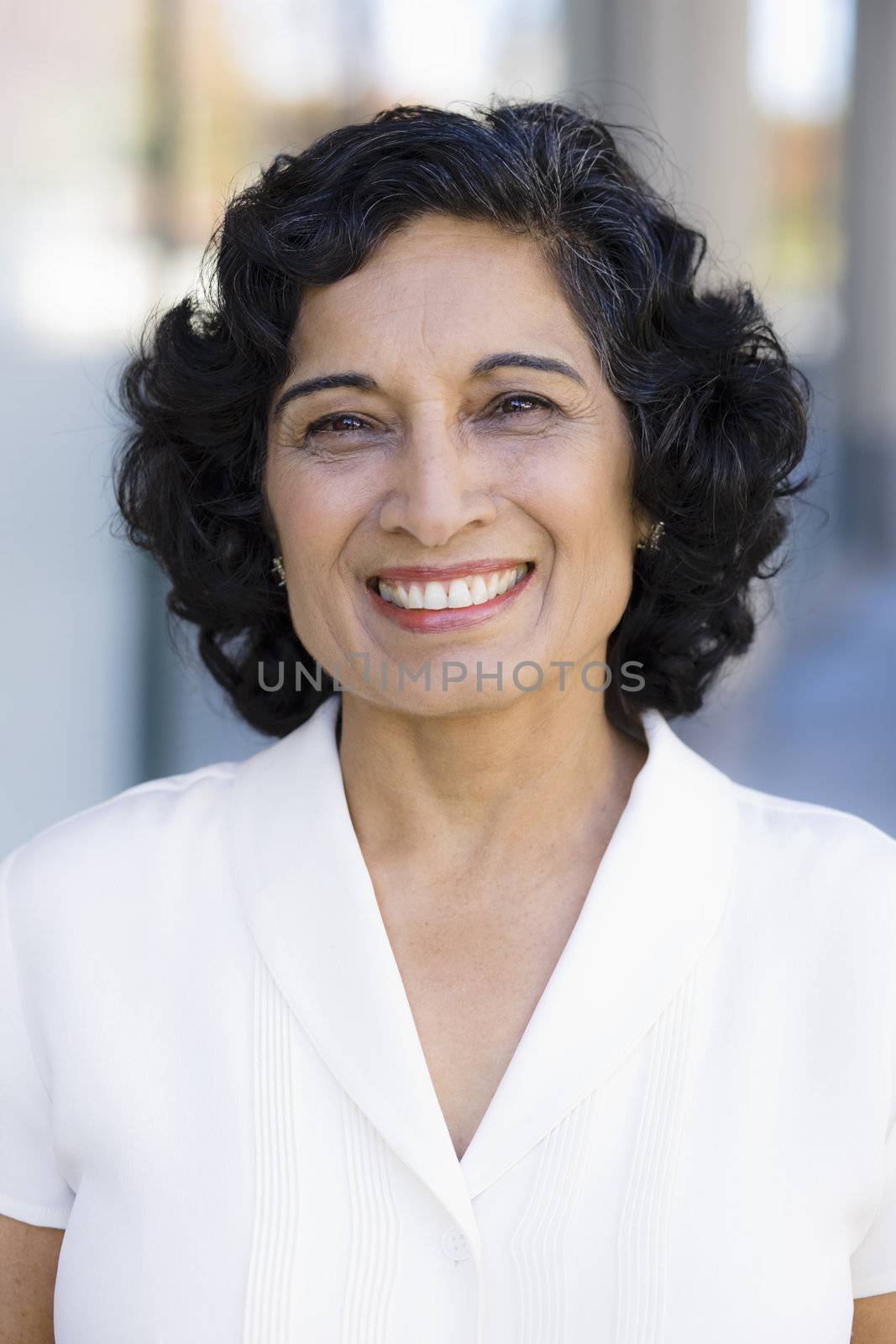 Portrait of a Smiling Indian Businesswoman Standing Outside