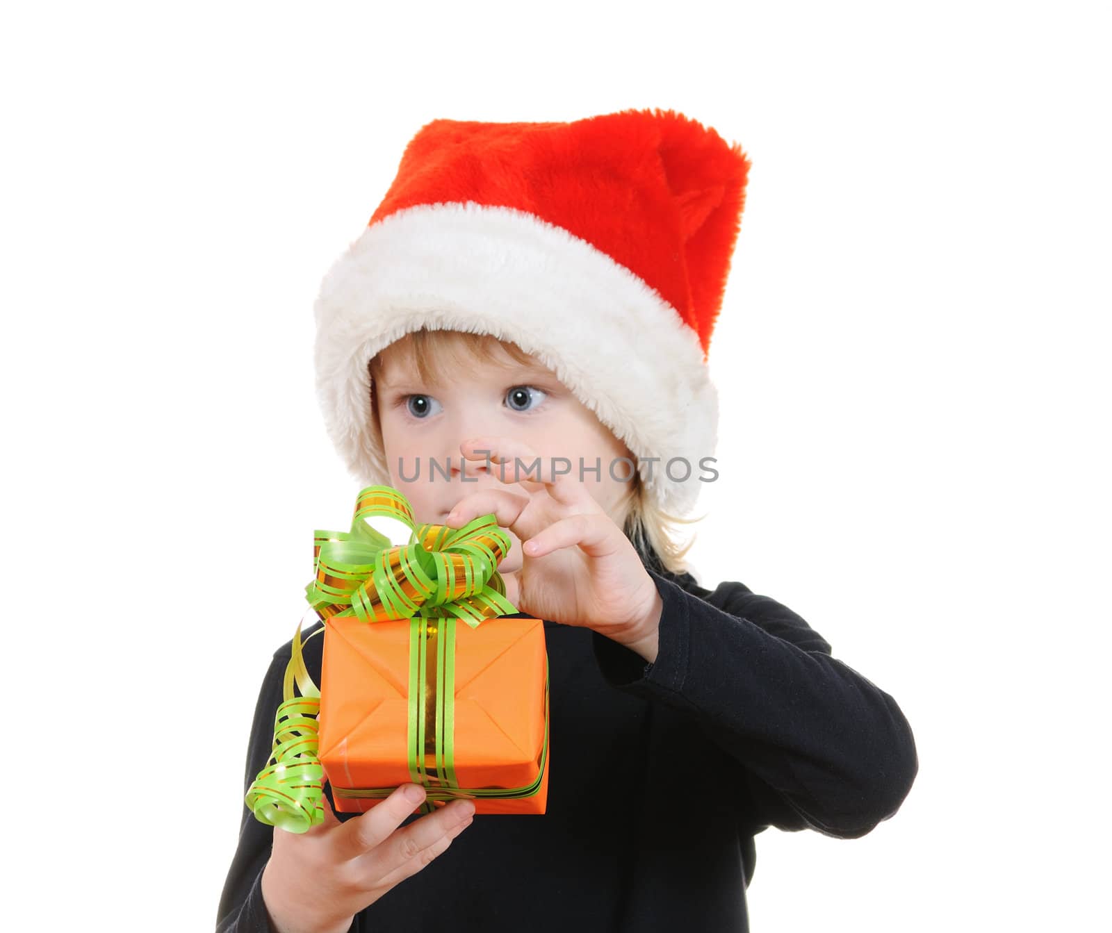 The child in a hat santa claus isolated on white background