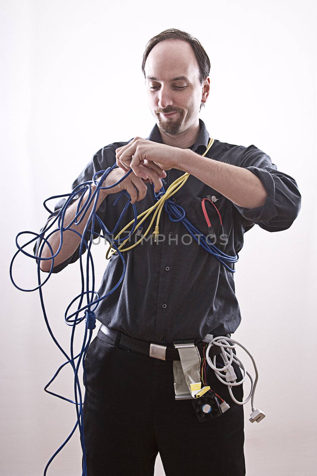 Computer technician entangle in network cable