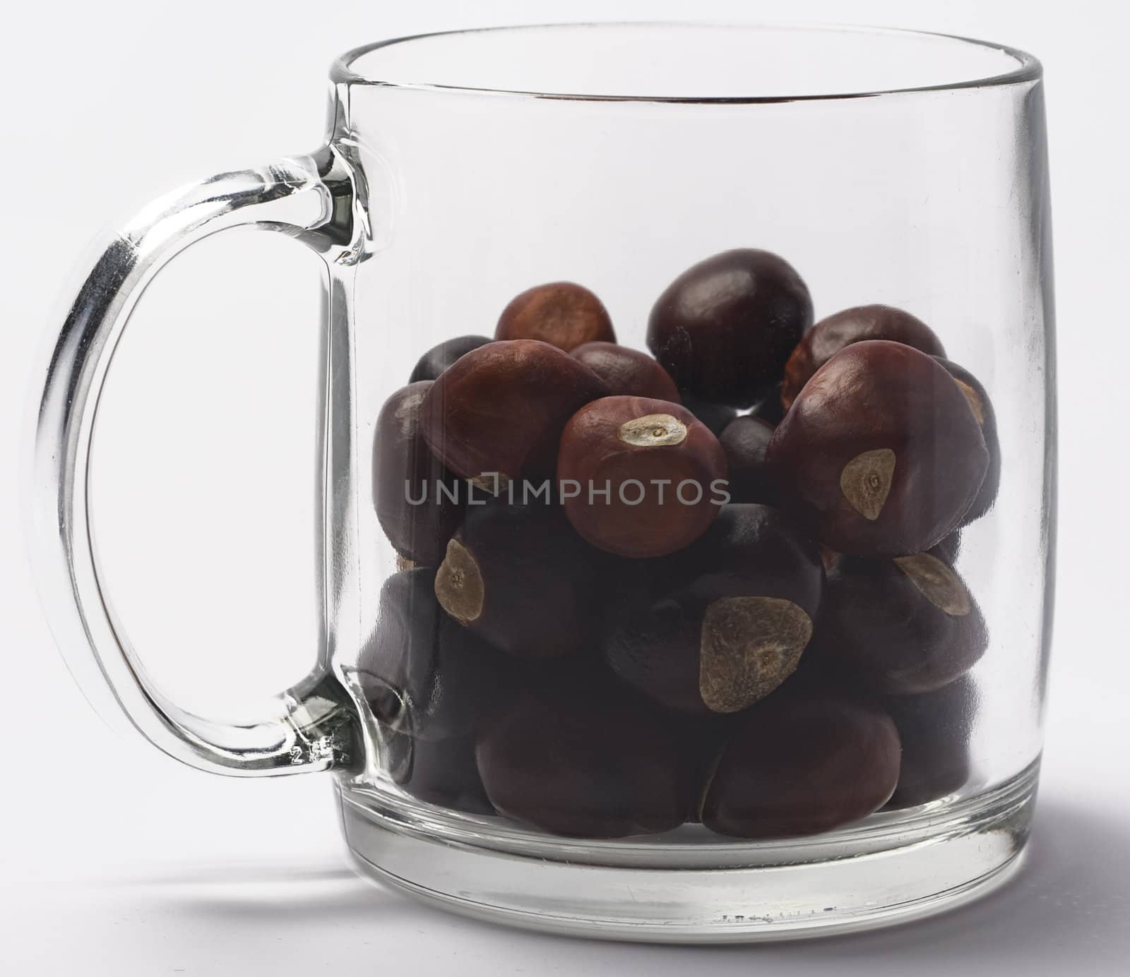 Glass filled with wild nuts