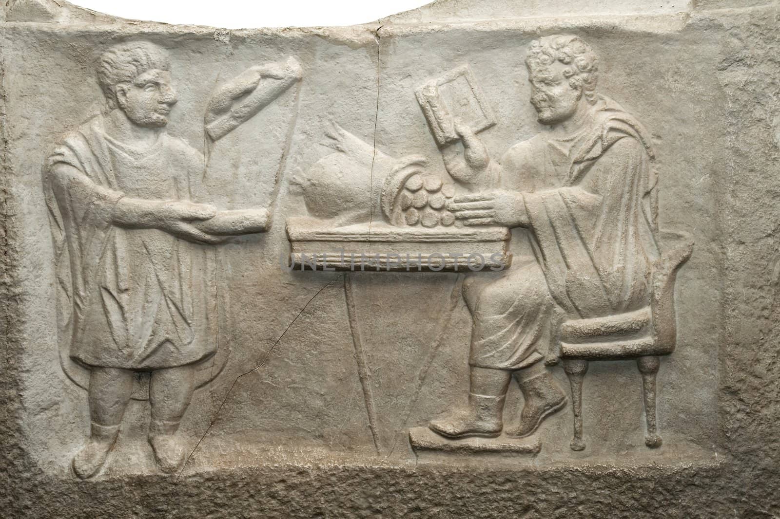 Shop moneychangers. The Roman bas-relief. Ancient financial transactions