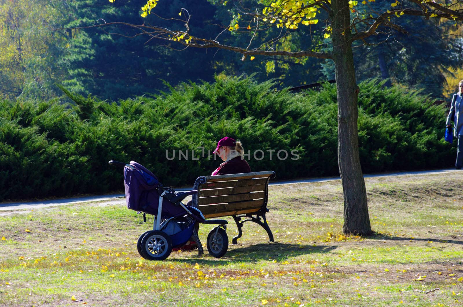 Woman with baby in park

