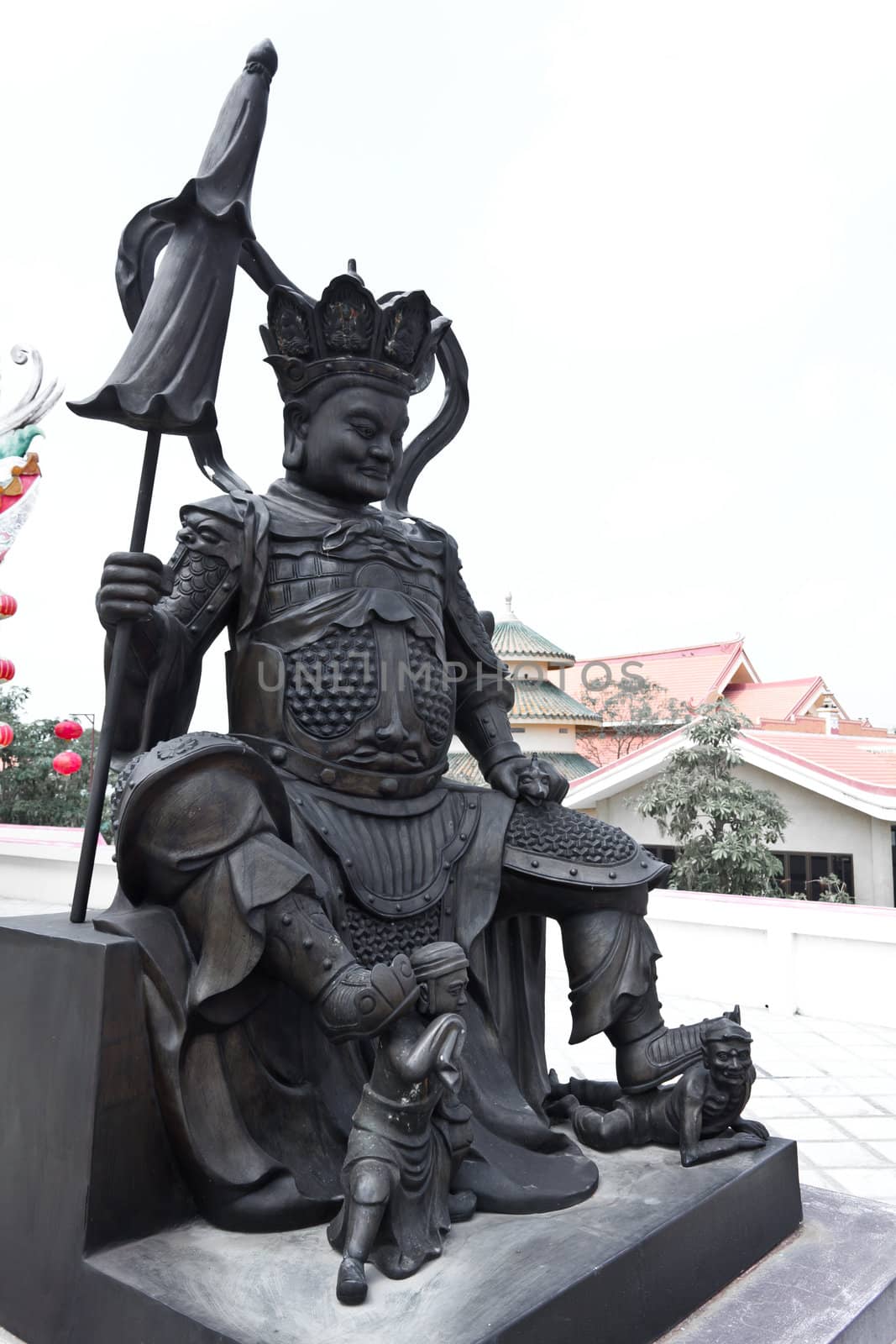 Chinese god sitting statue in chinese temple by lavoview