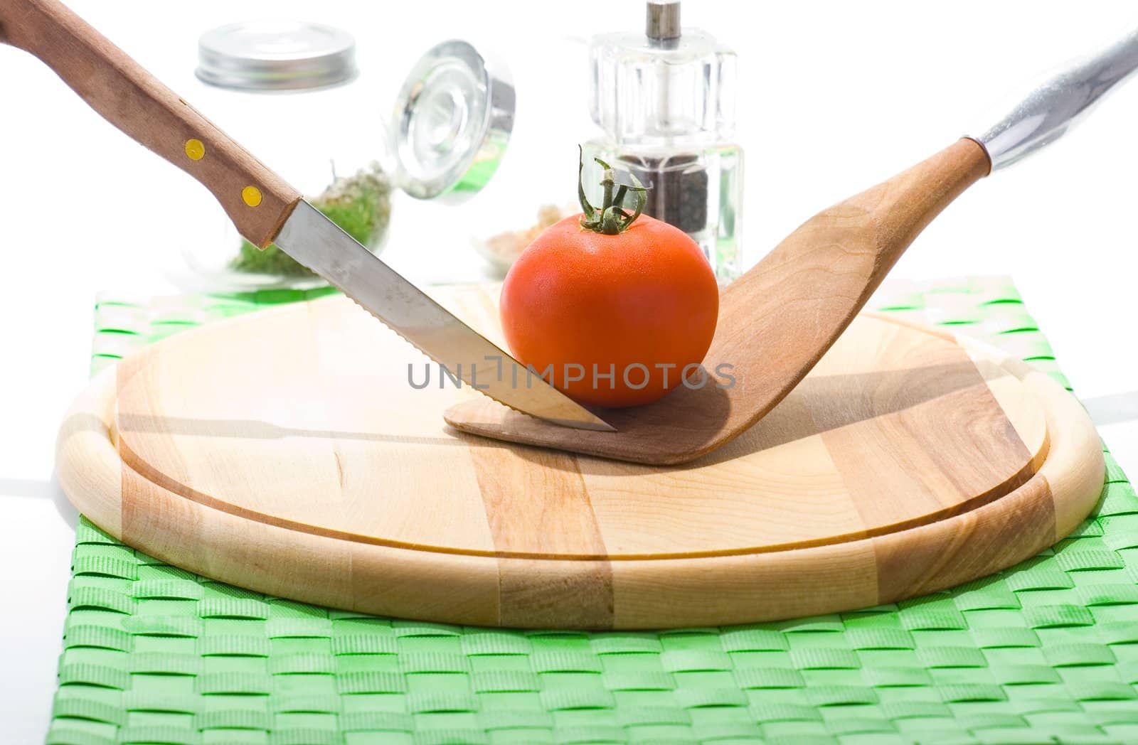 Ripe juicy red tomato on a cutting board