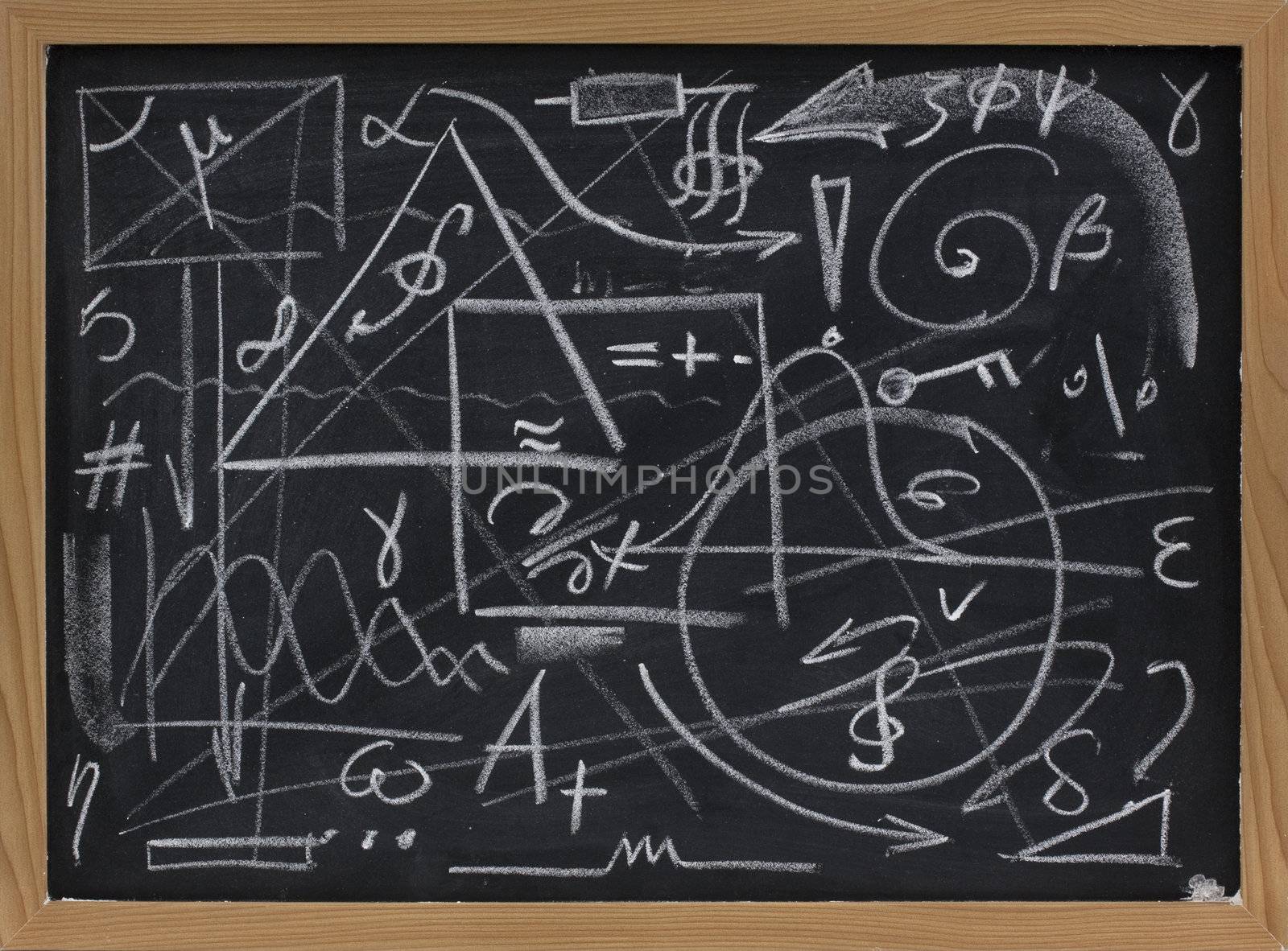 random lines, geometrical shapes, symbols on a blackboard - chaos, mess or information overload concept