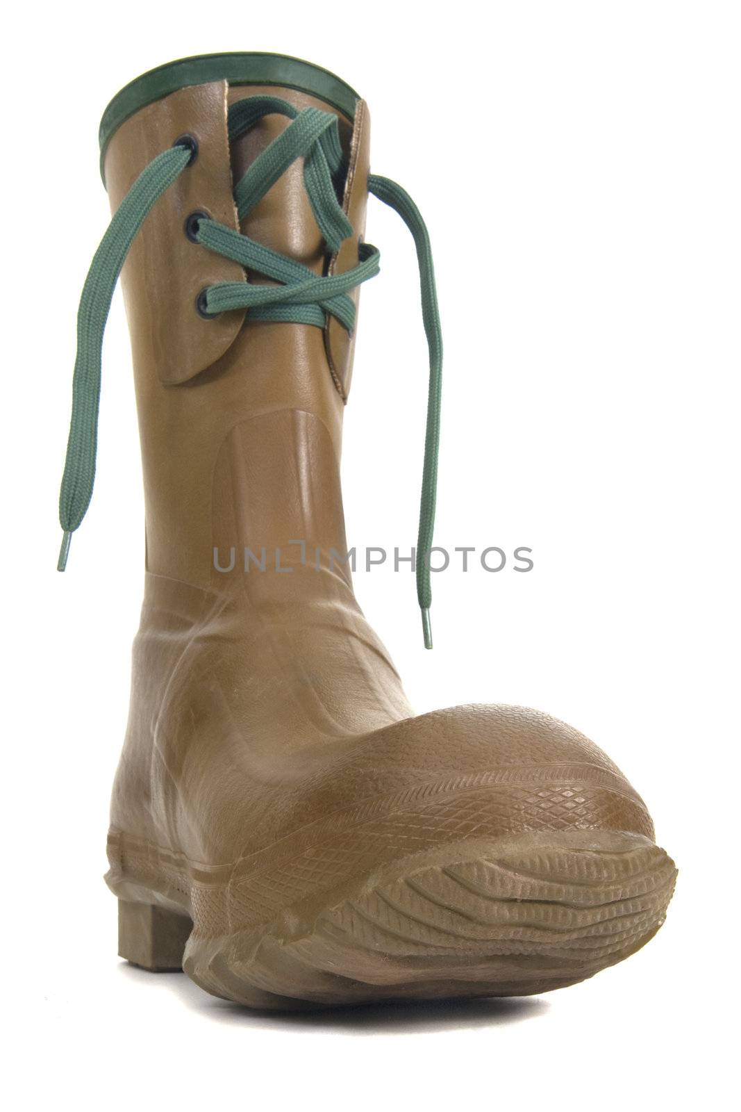 heavy rubber boot with laces on white background, distorted low wide angle perspective