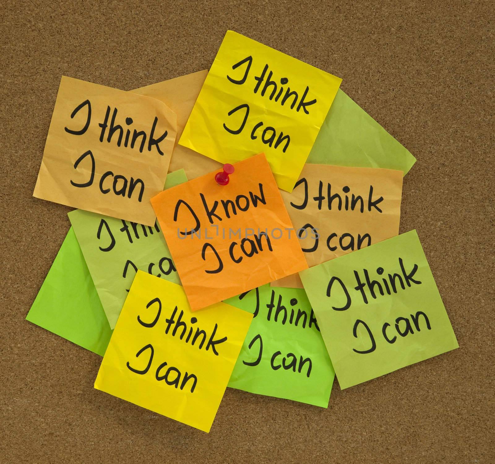 I know I can - self confidence and motivational concept, presented with a pile of sticky notes on cork bulletin board