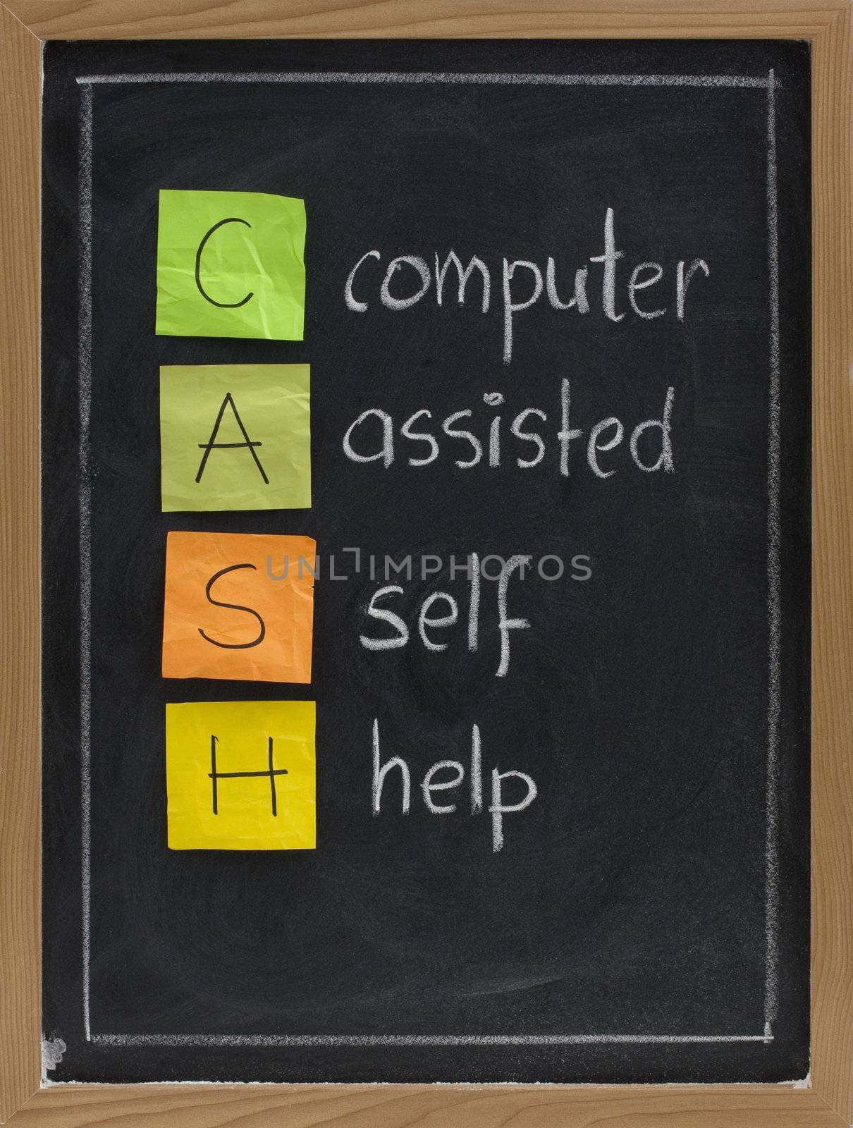 CASH - computer assisted self help - acronym for modern age, presented on blackboard with white chalk handwriting and color sticky notes