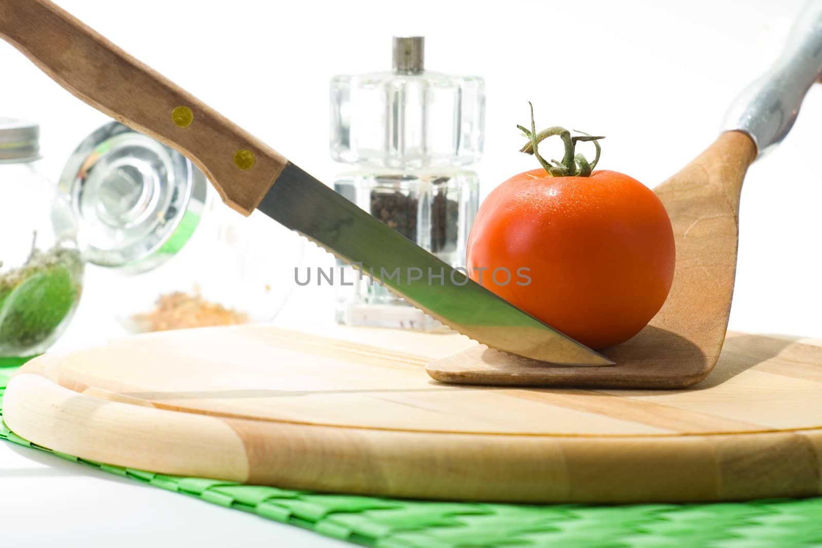 Ripe juicy red tomato on a cutting board